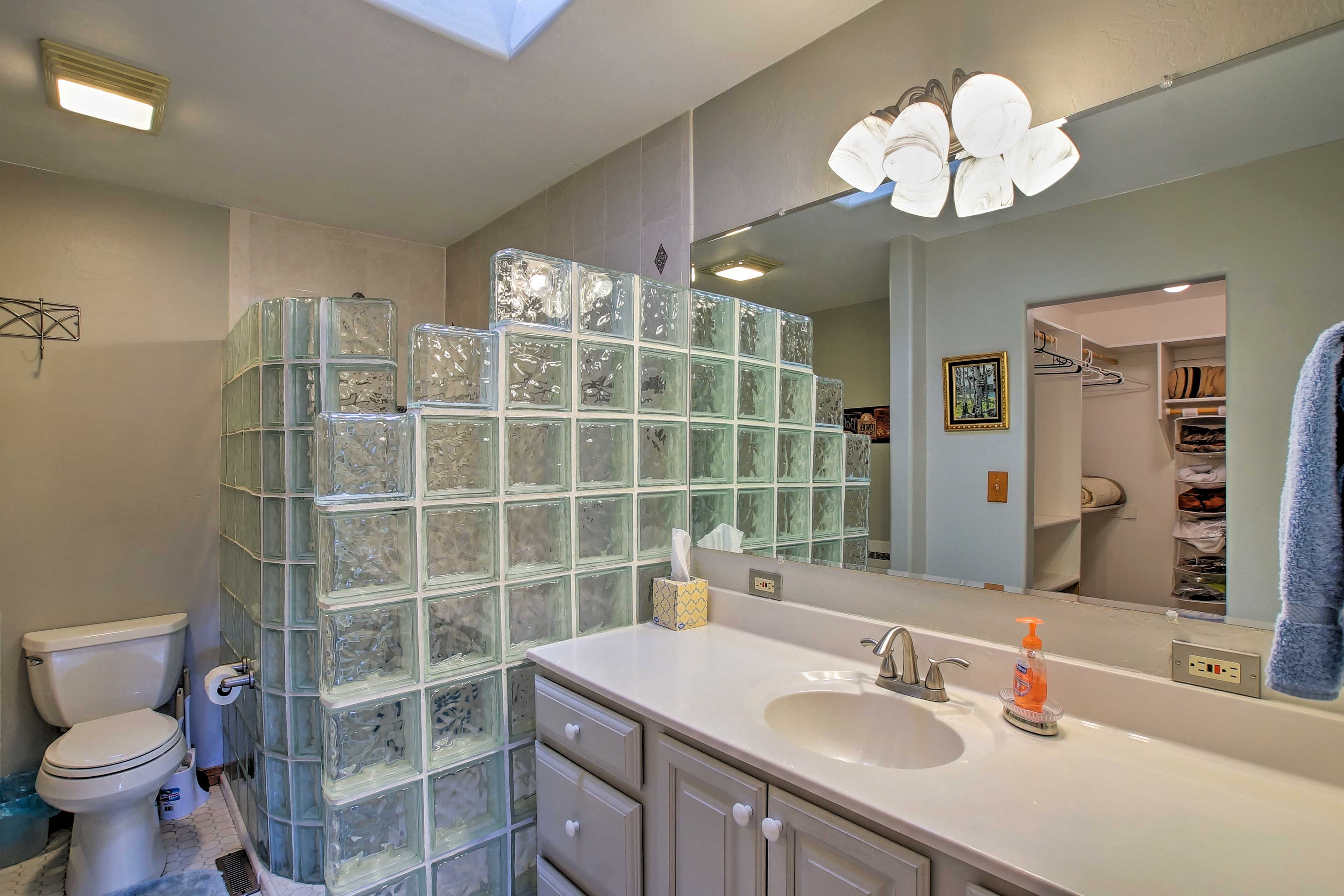 The first bedroom offers the added luxury of an en-suite bathroom.