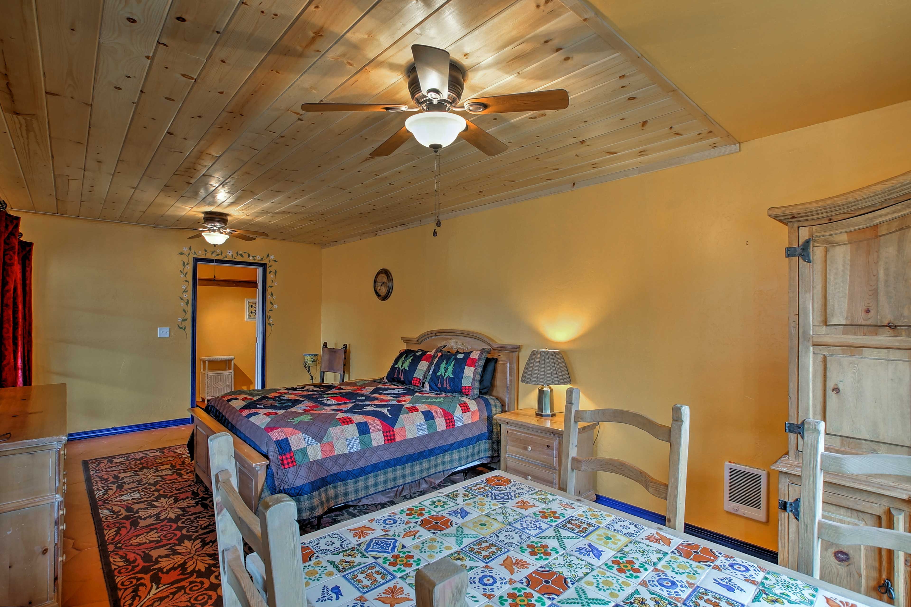The casita houses a queen bed and sitting area.