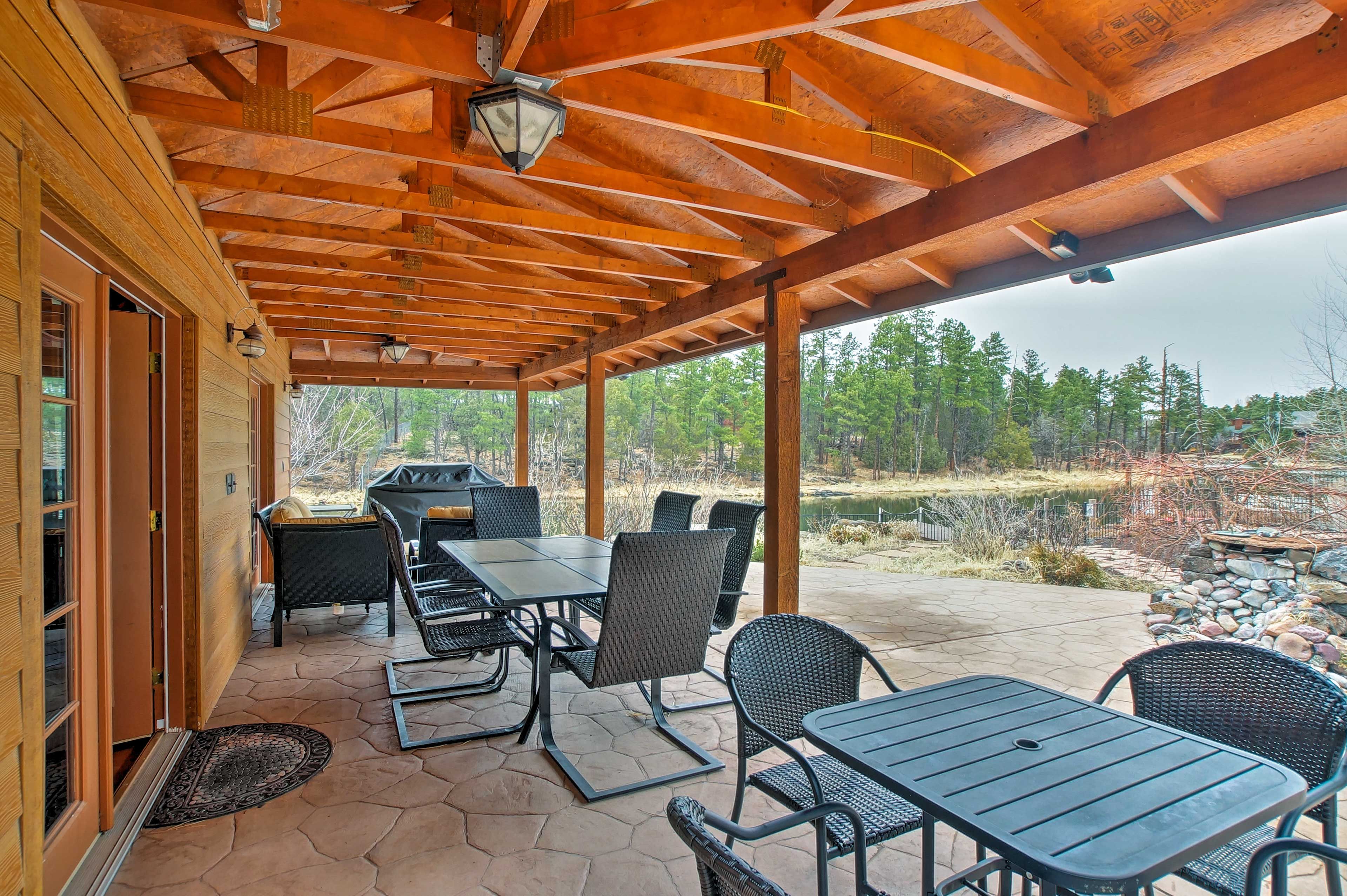 Host a cookout on the covered patio featuring a Pro Series grill.
