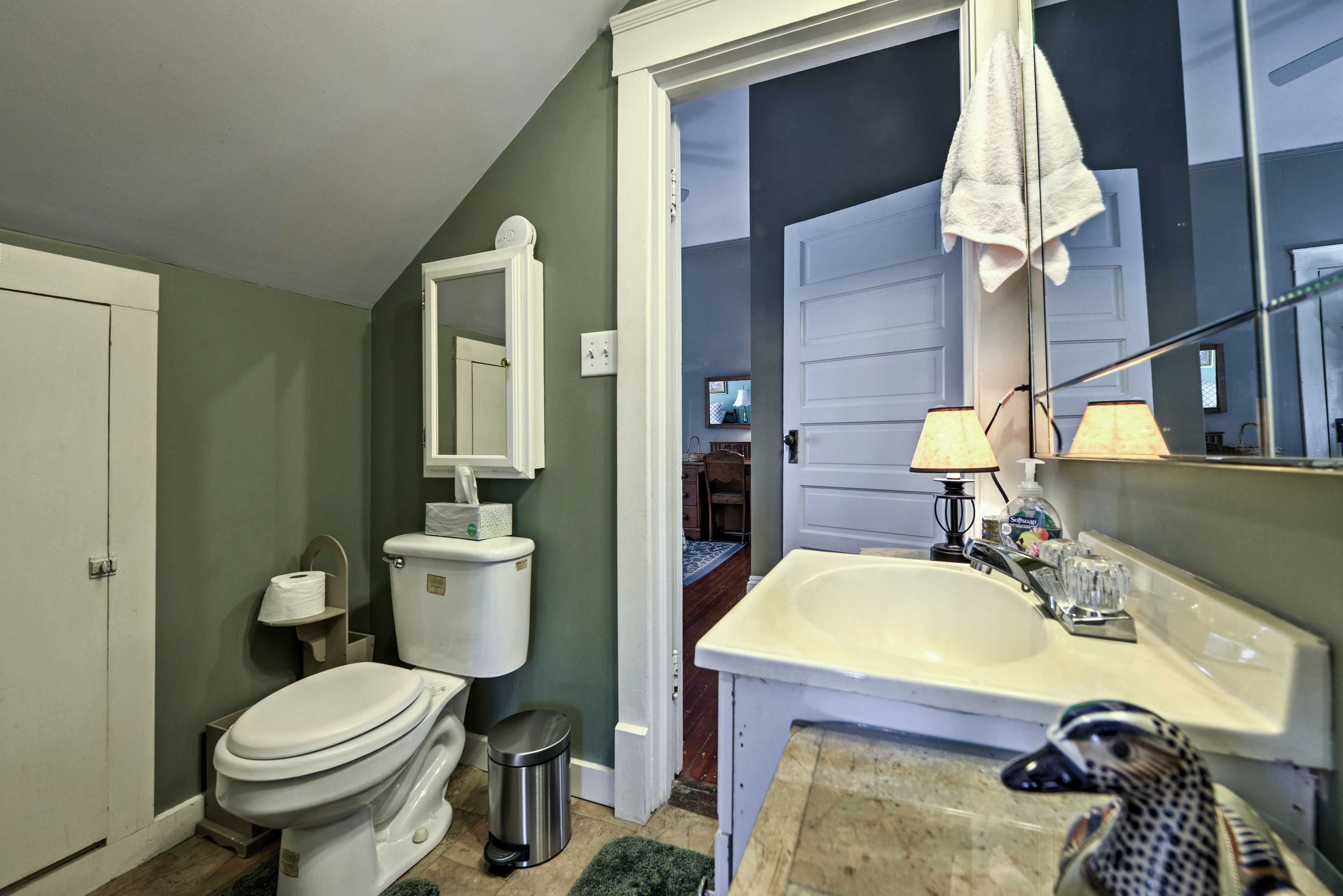 The half bathroom is conveniently connected to the second bedroom.