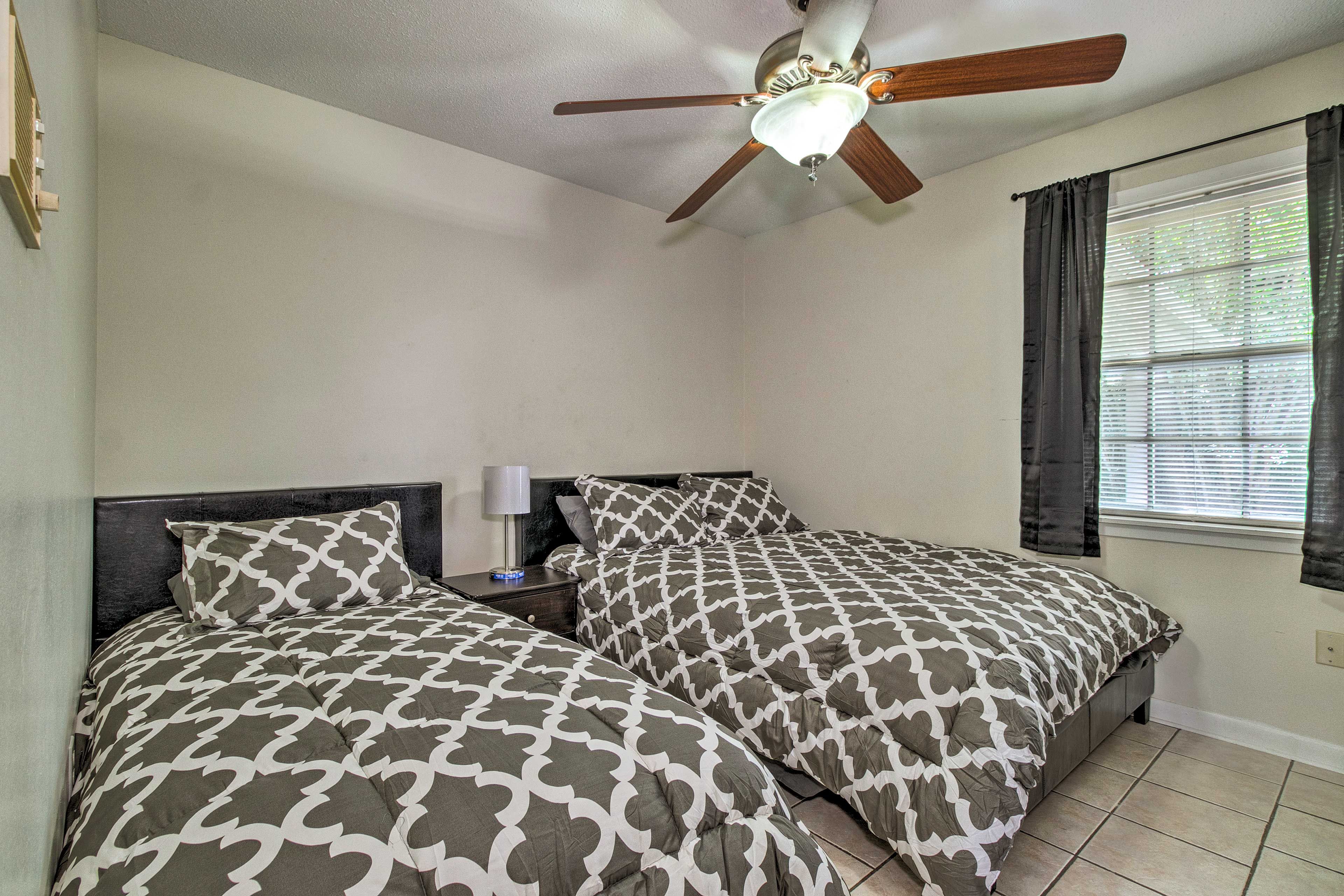 Dreams come easily in this cozy third bedroom.