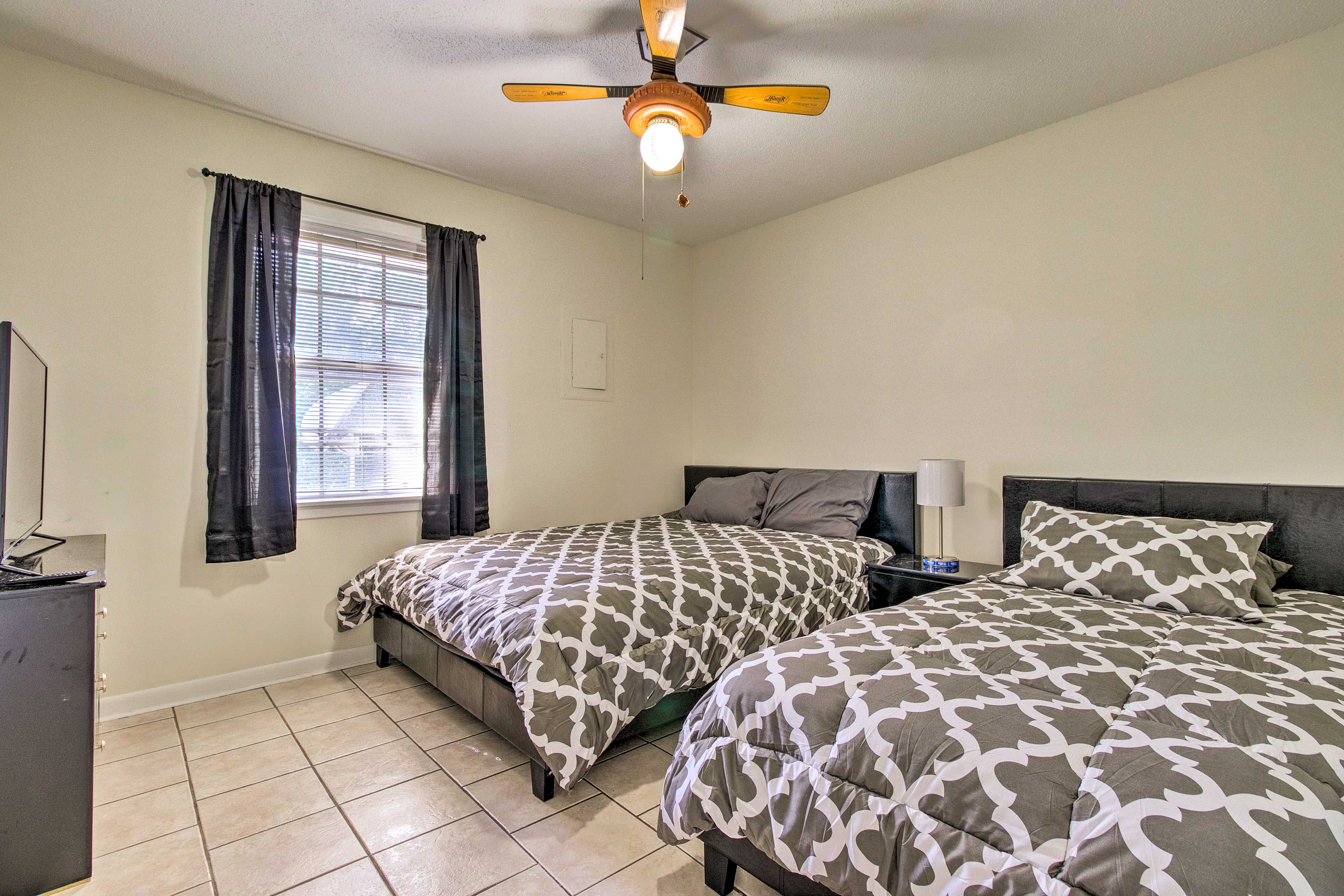 Wake up to natural light or close the curtains for a lazy morning in bed.