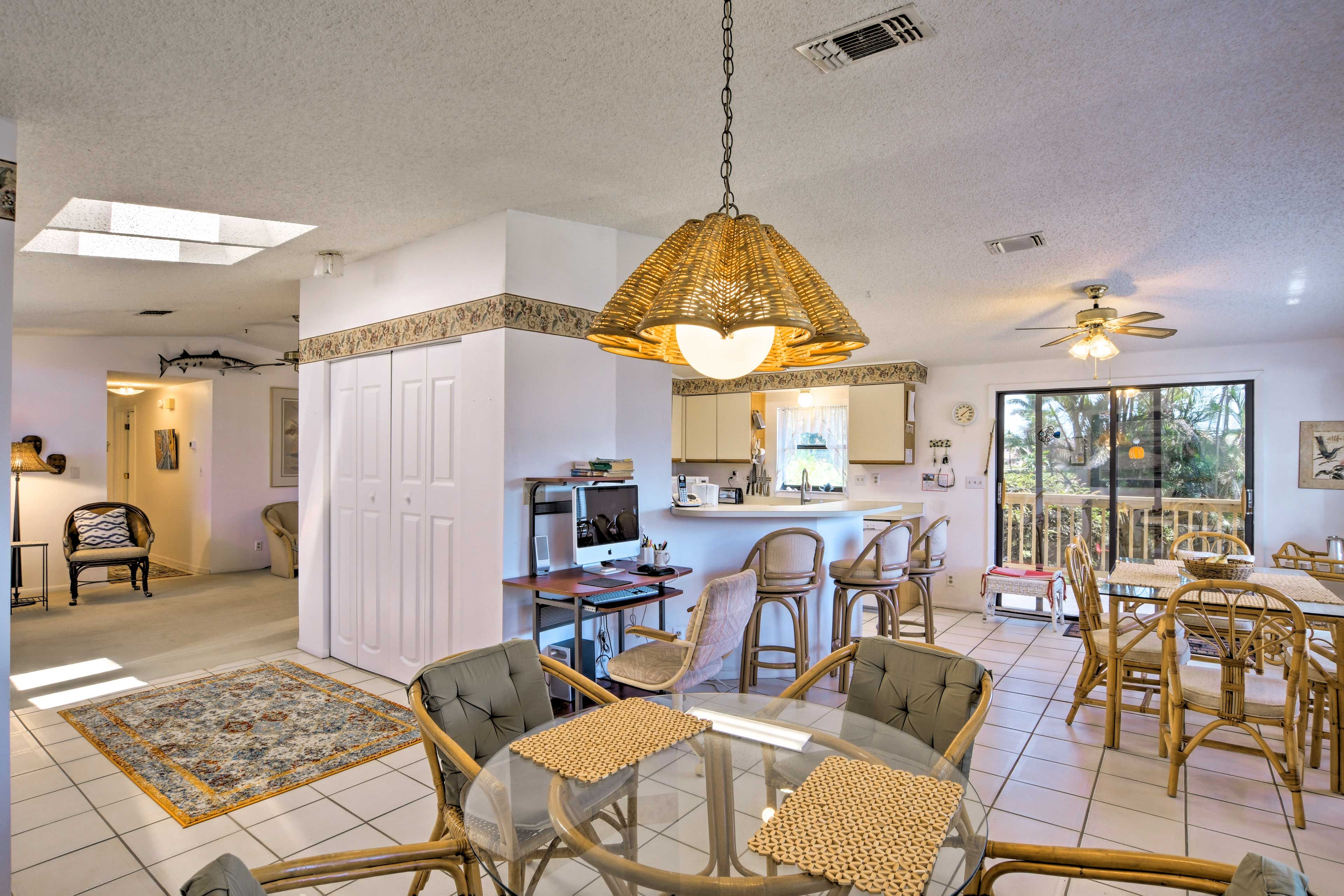 The open-concept layout leads to the living area.