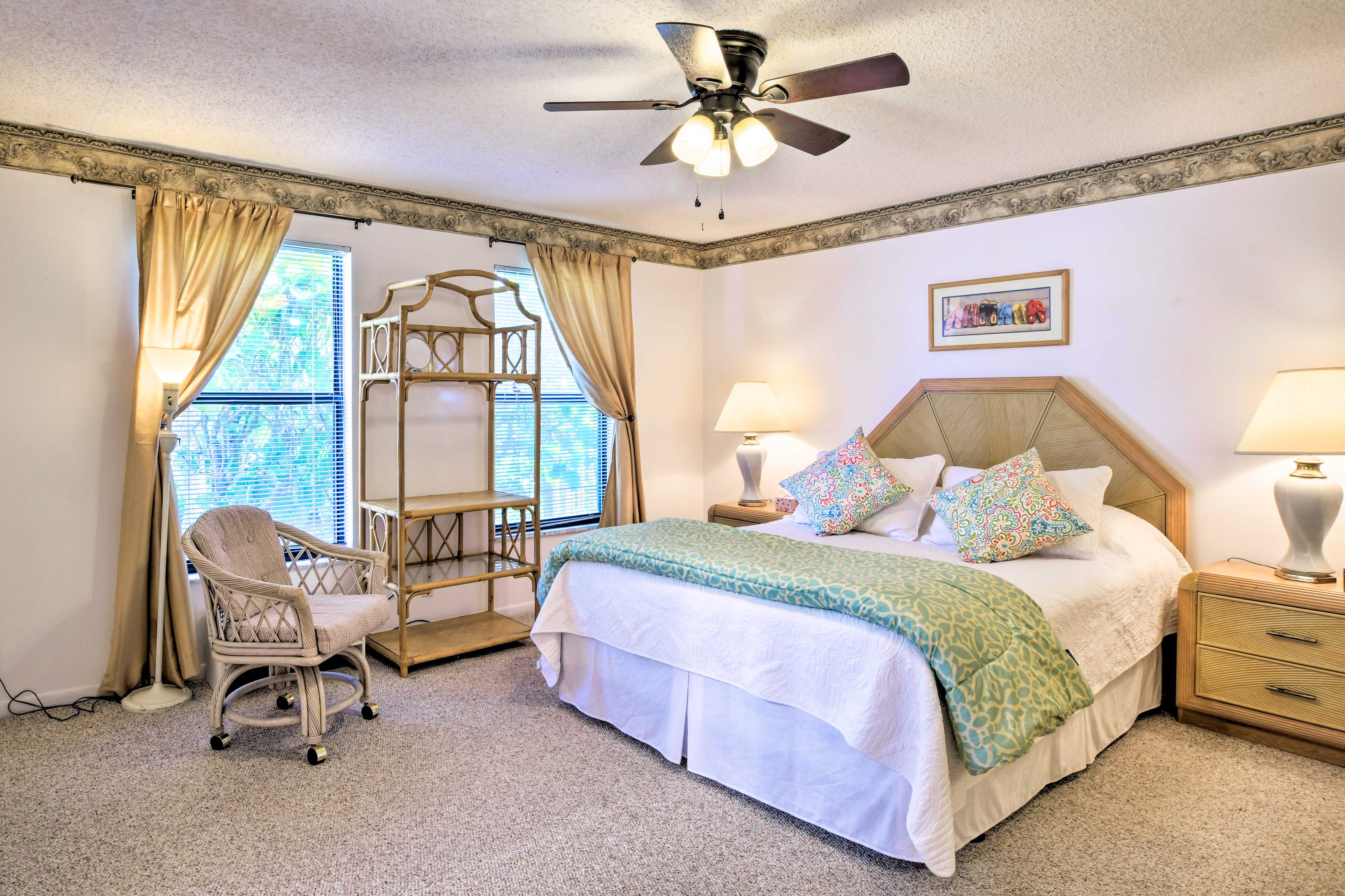 This bedroom offers a plush king bed.