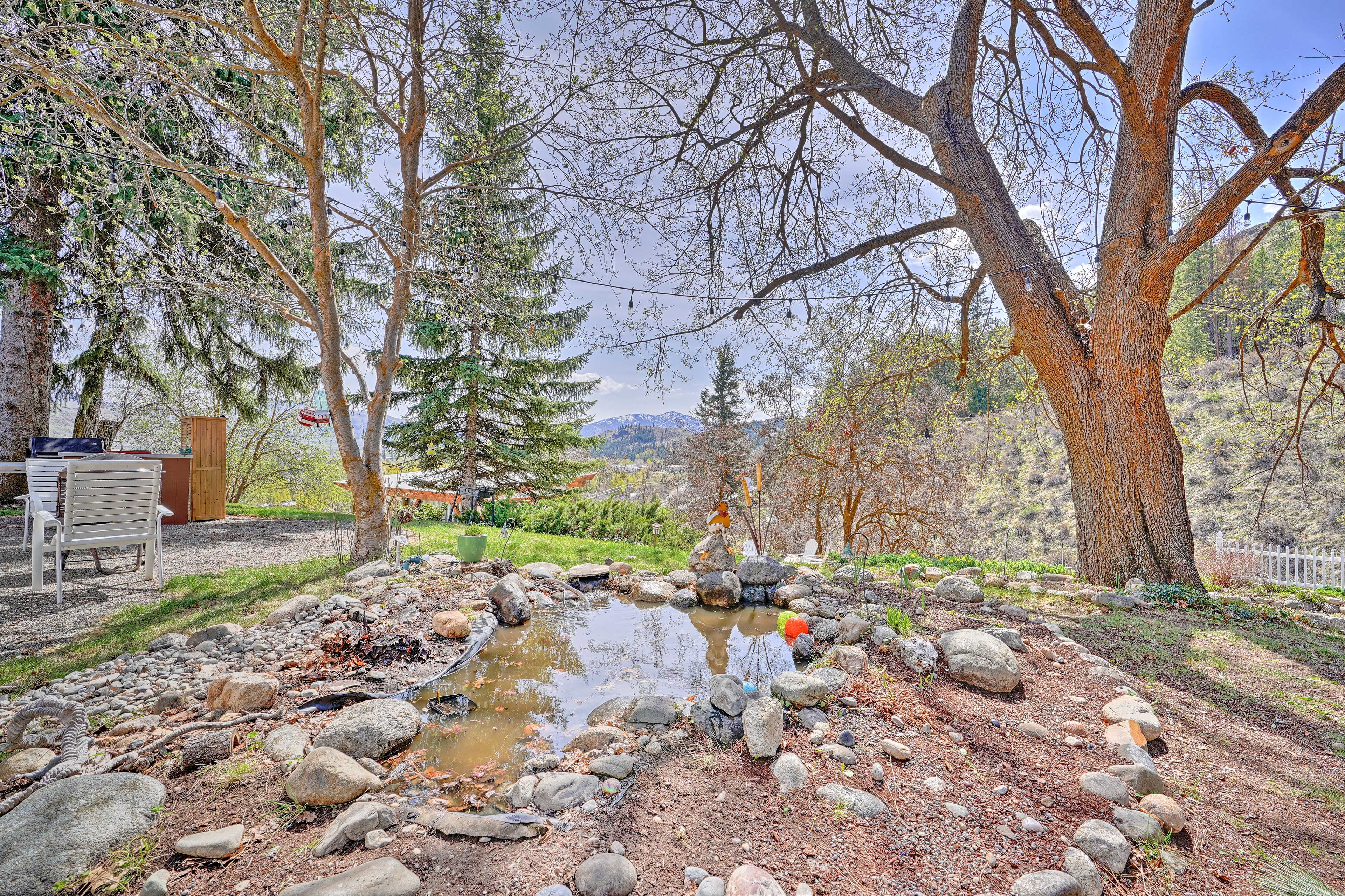 Sit by the home’s little pond and listen to the wind rustling through the trees.