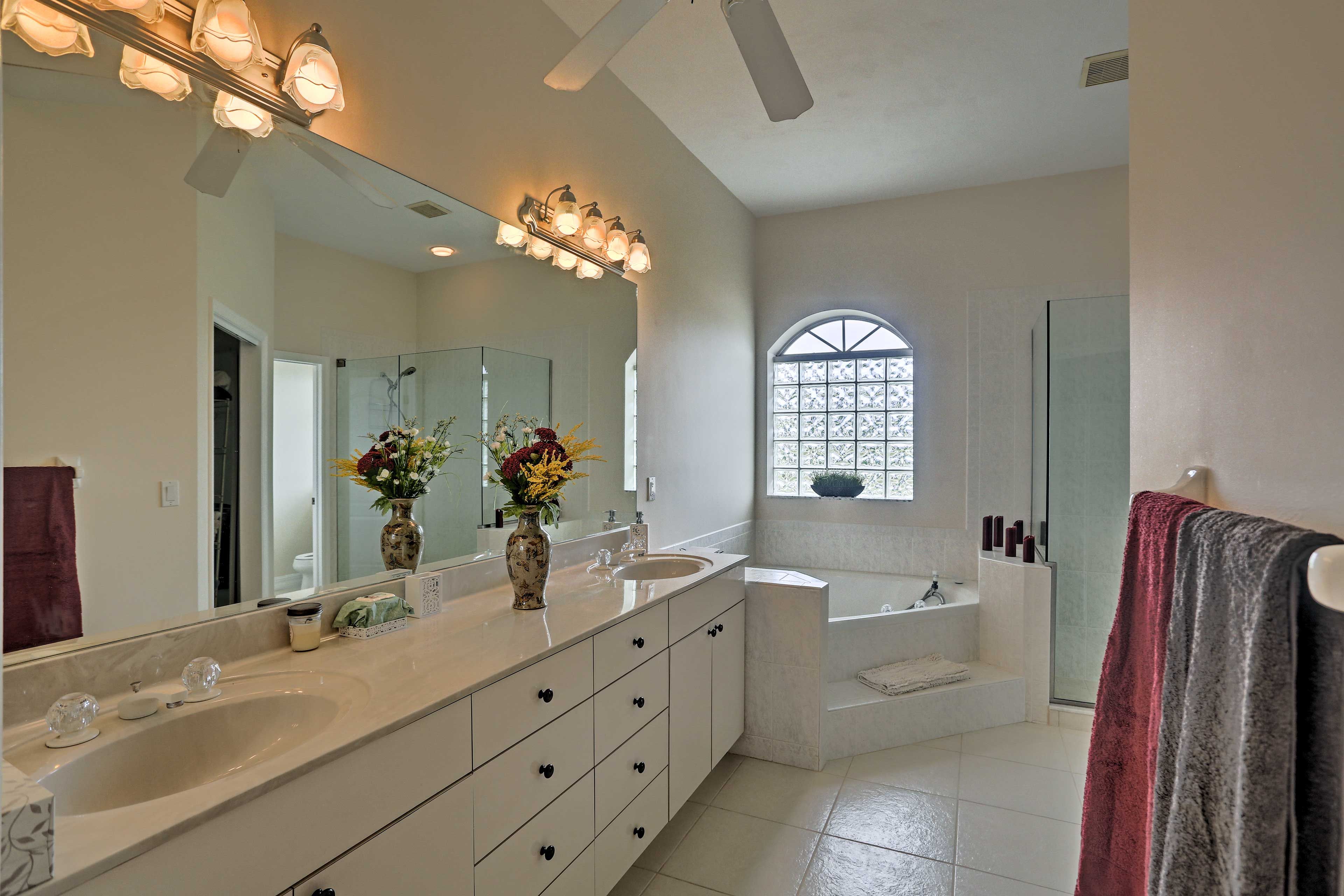 The walk-in shower and built-in tub make this en-suite bathroom stellar.