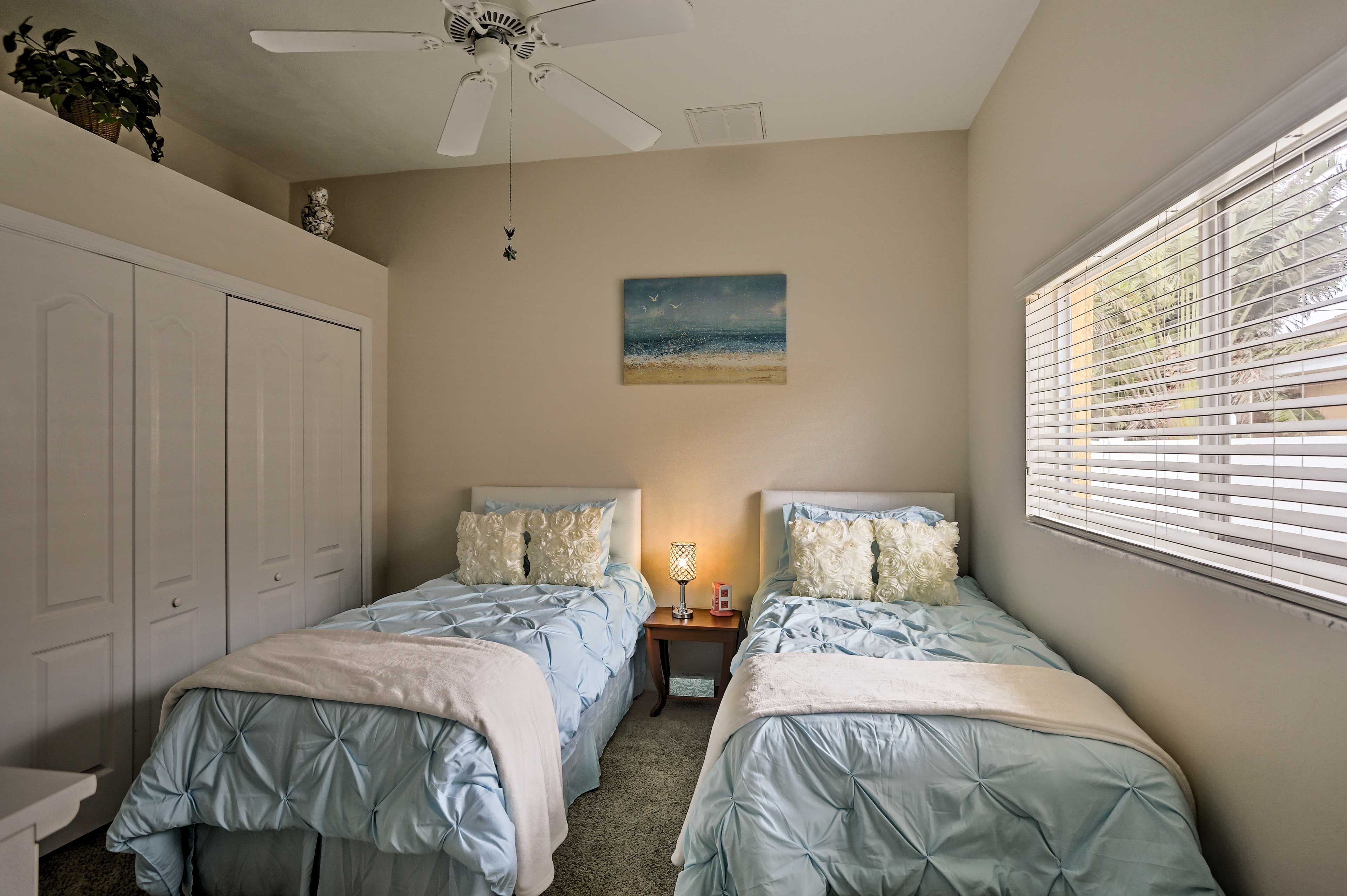 Kiddos can have their own space in this third bedroom with 2 twin beds.