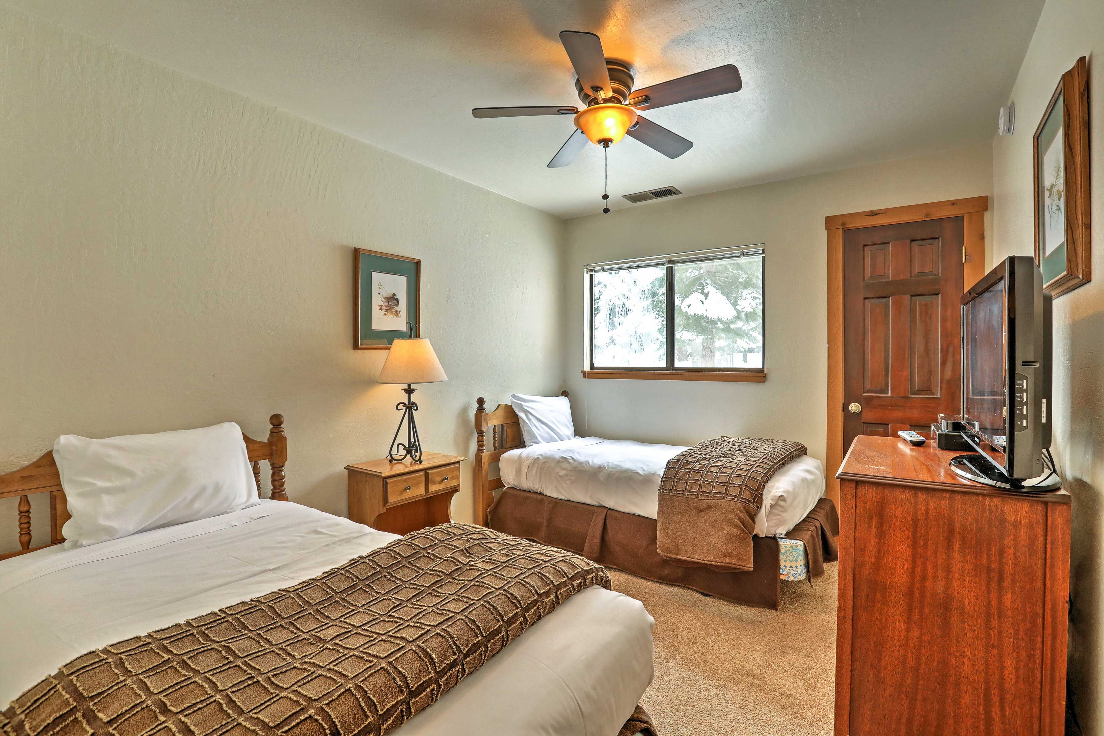 Kids can claim this bedroom with 2 twin beds.
