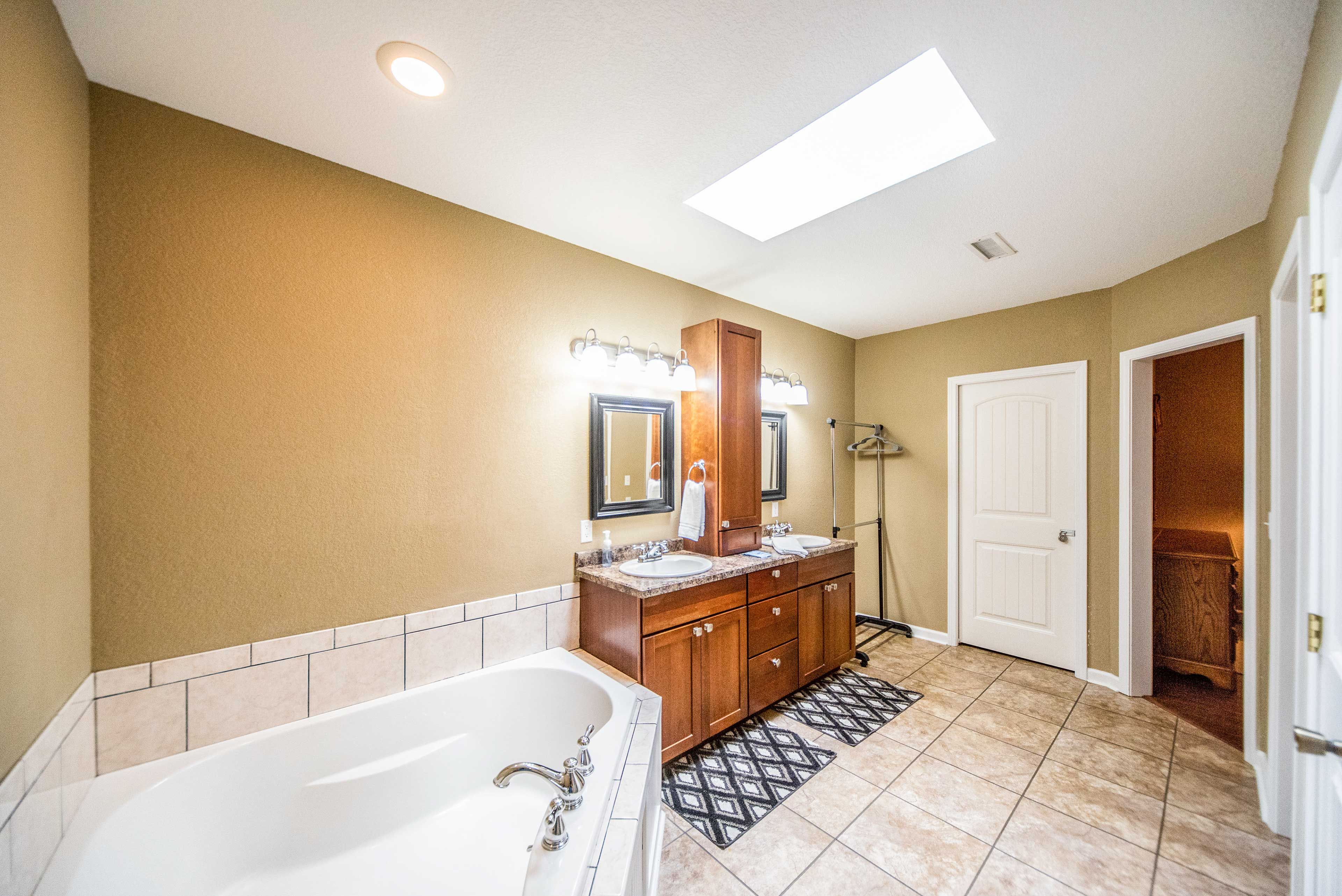 Enjoy a soak in the luxurious tub.