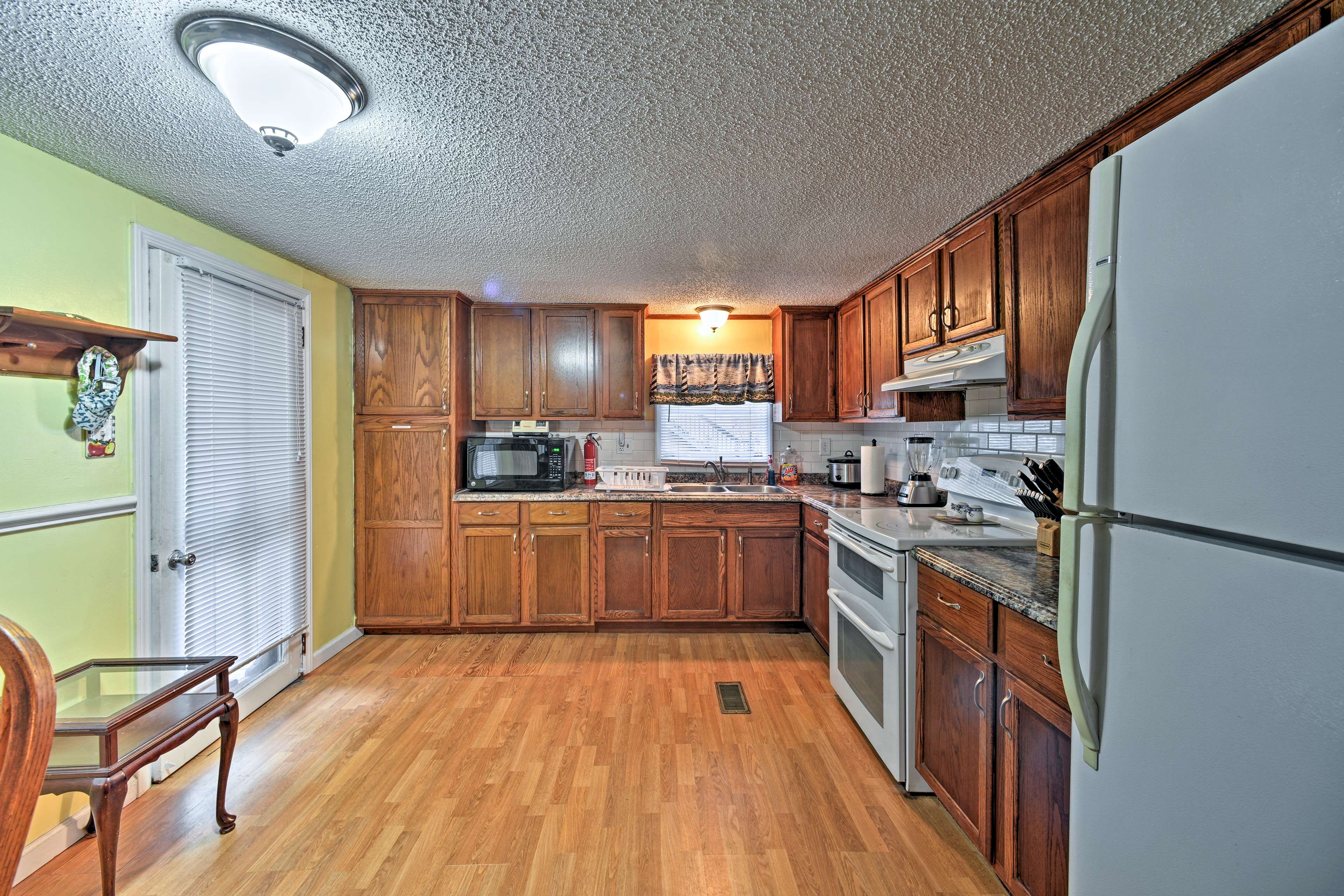 The kitchen comes fully equipped with everything you need for home-cooking.