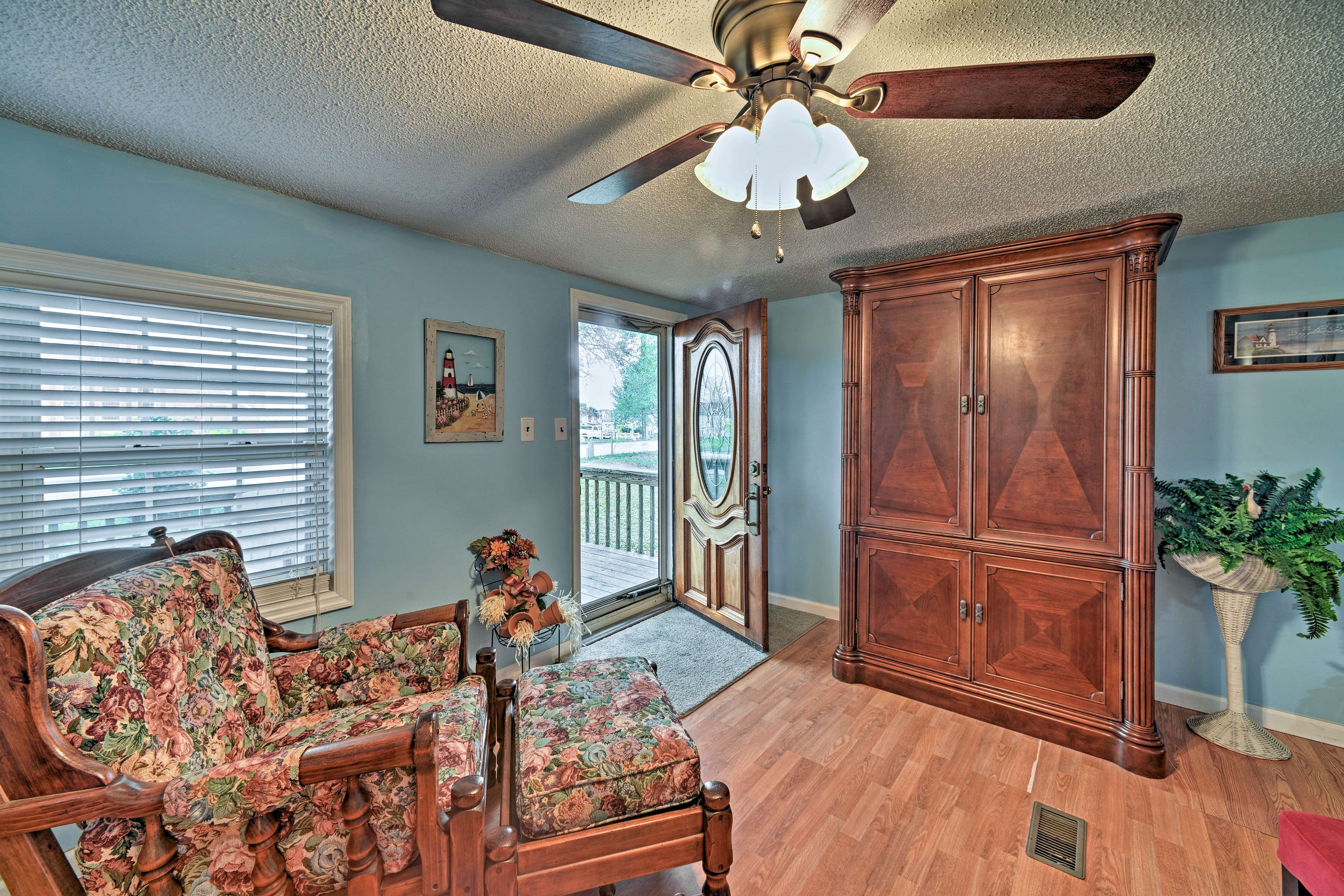 The formal living room welcomes you back home daily.