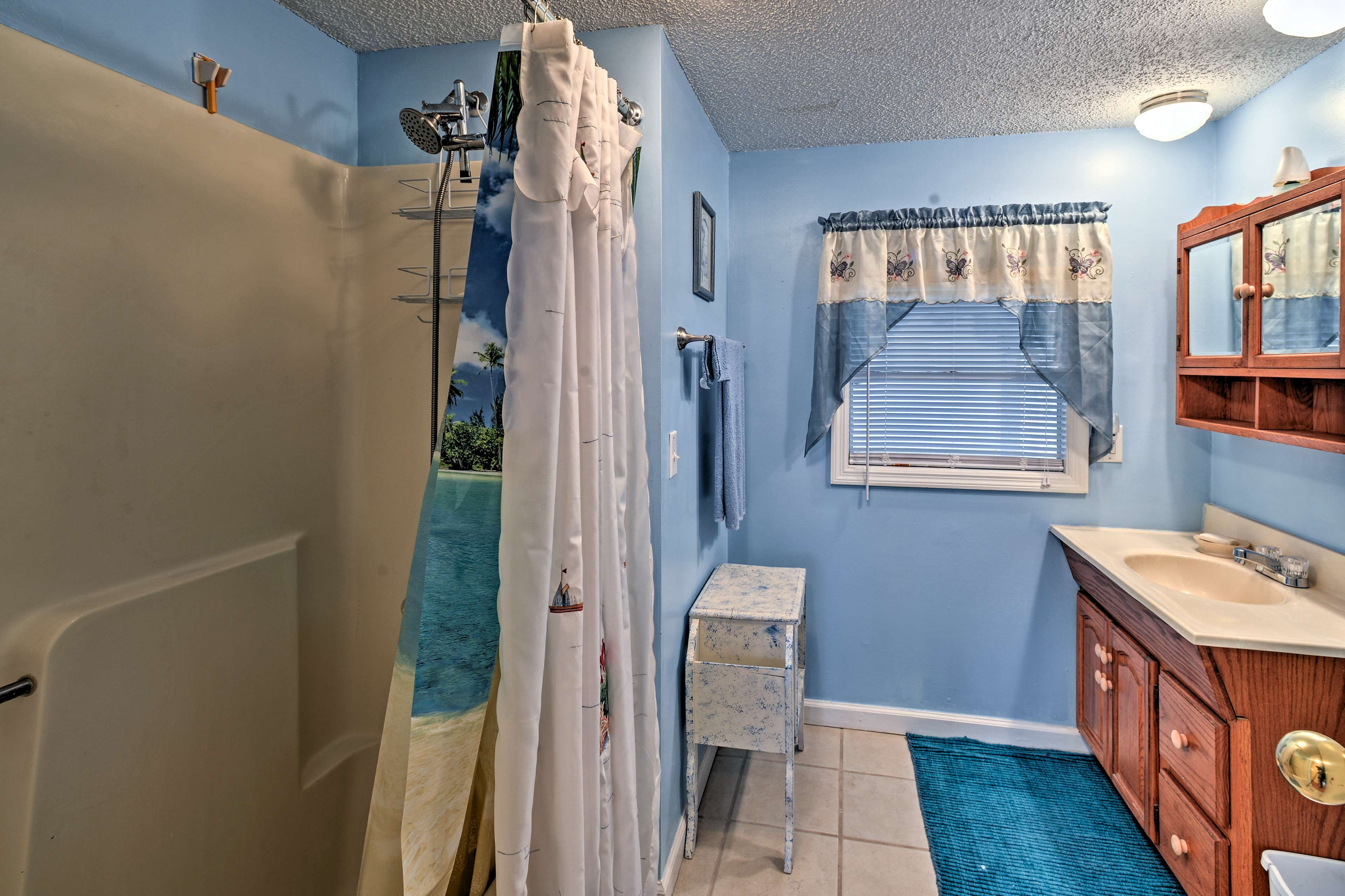 After a day in the ocean, rinse off in one of the 2 full bathrooms.