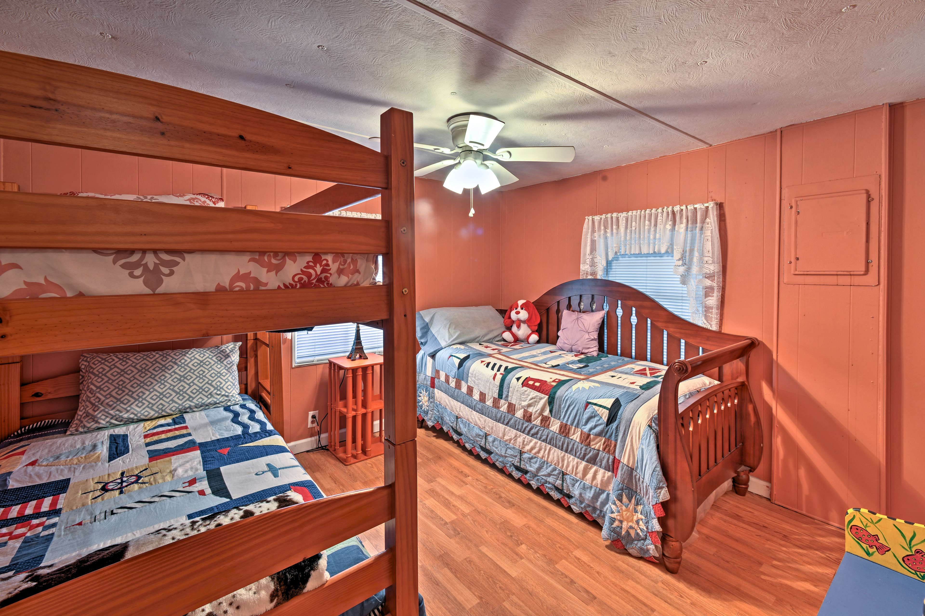 The third bedroom is furnished with a twin-over-twin bunk bed and twin daybed.
