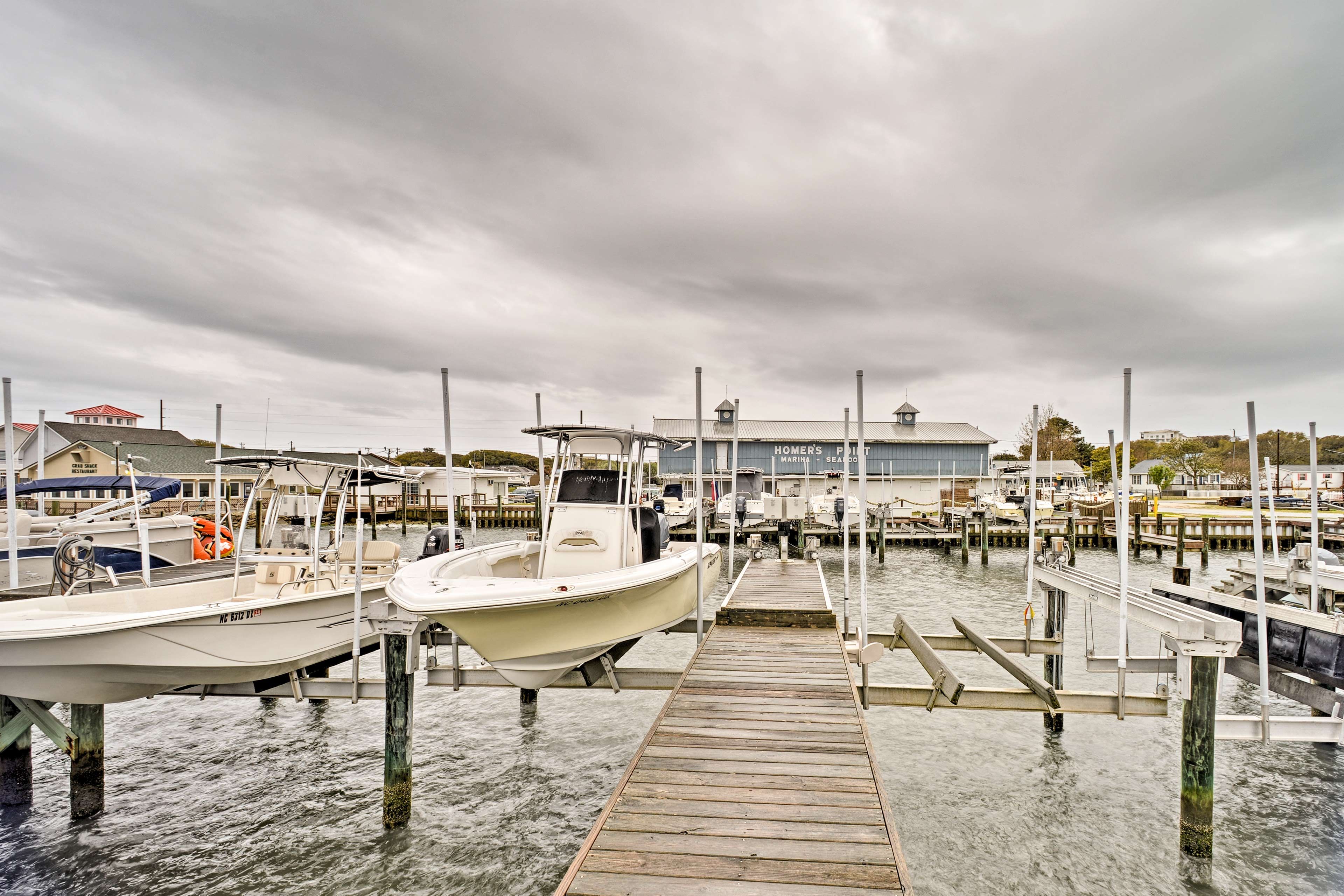 The home features a prime location just a short walk from the marina and beach!