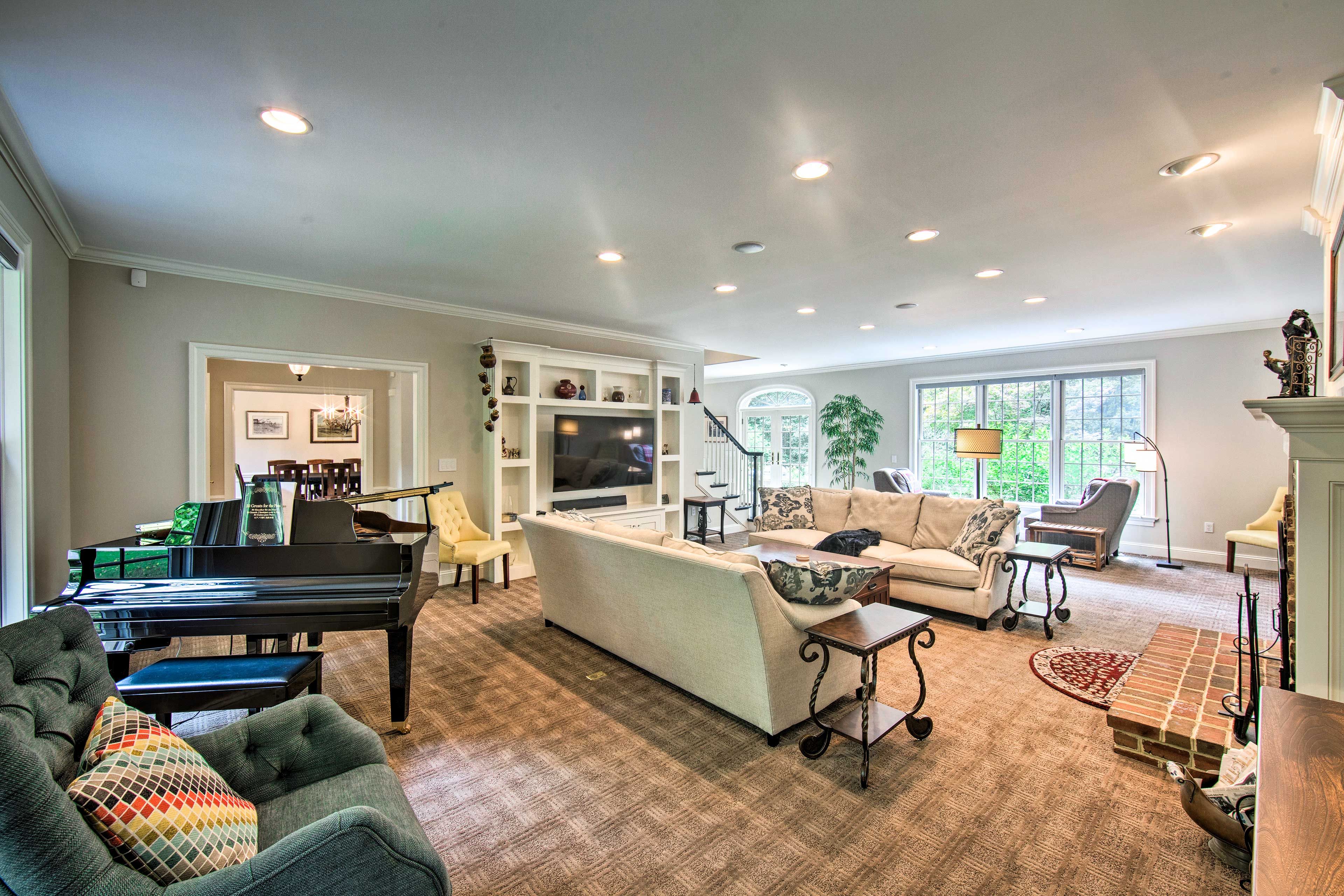 Lounge Room | Piano | Central A/C & Heating | 1st Floor