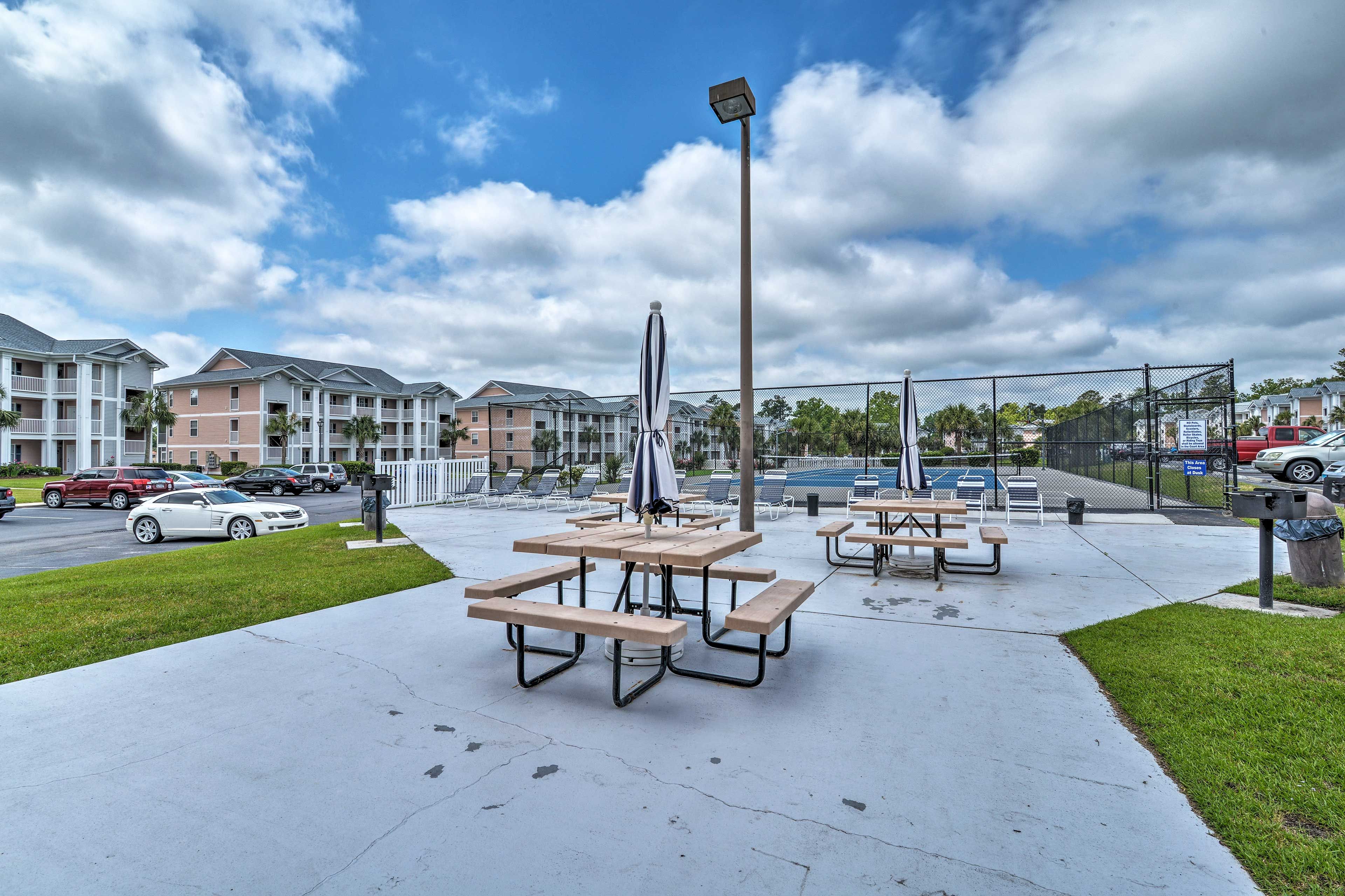 Enjoy dining al fresco at the community grill and picnic area.
