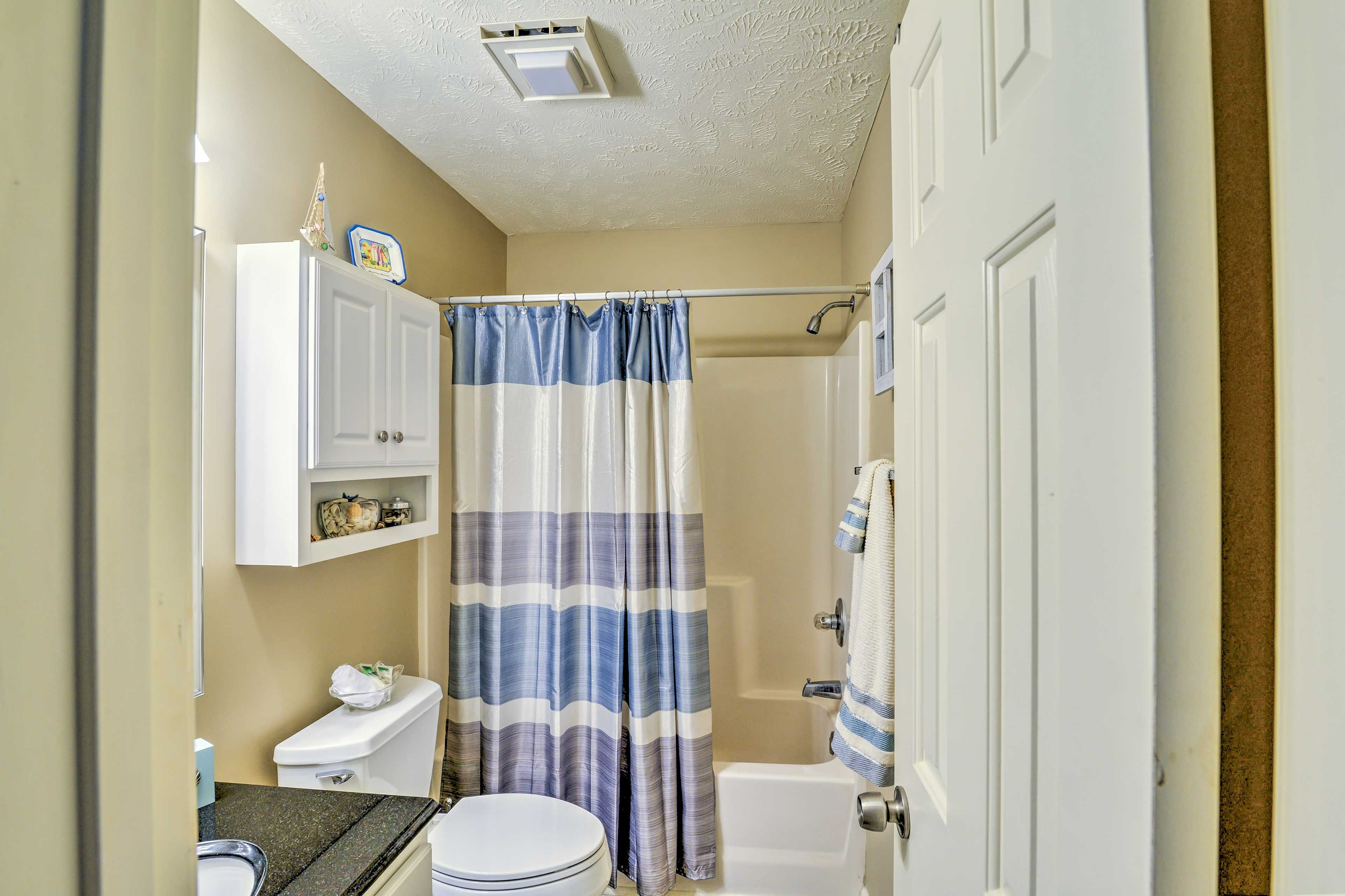 Each bathroom offers a shower/tub combo.