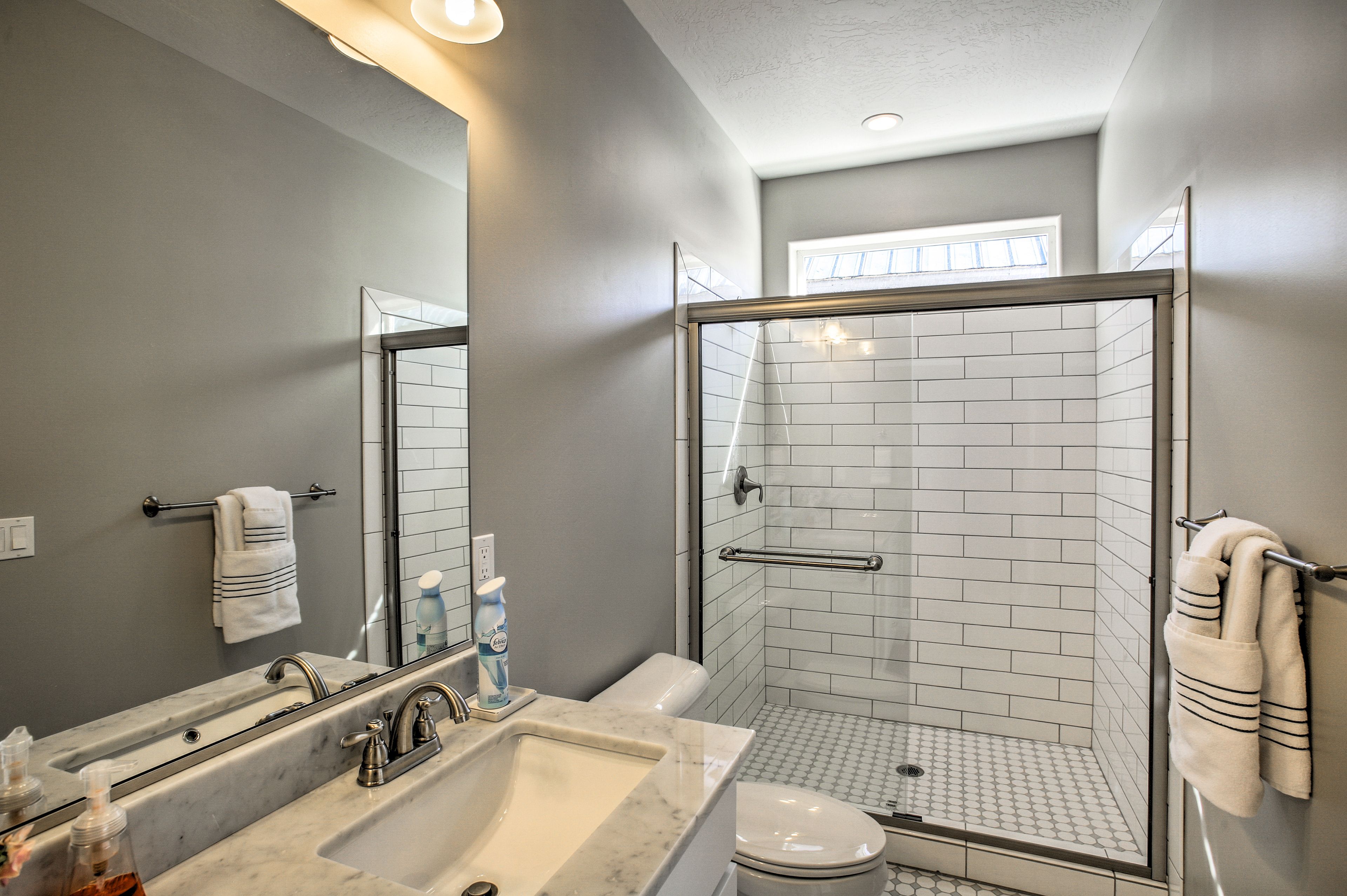 Stay clean in the glass walk-in shower.