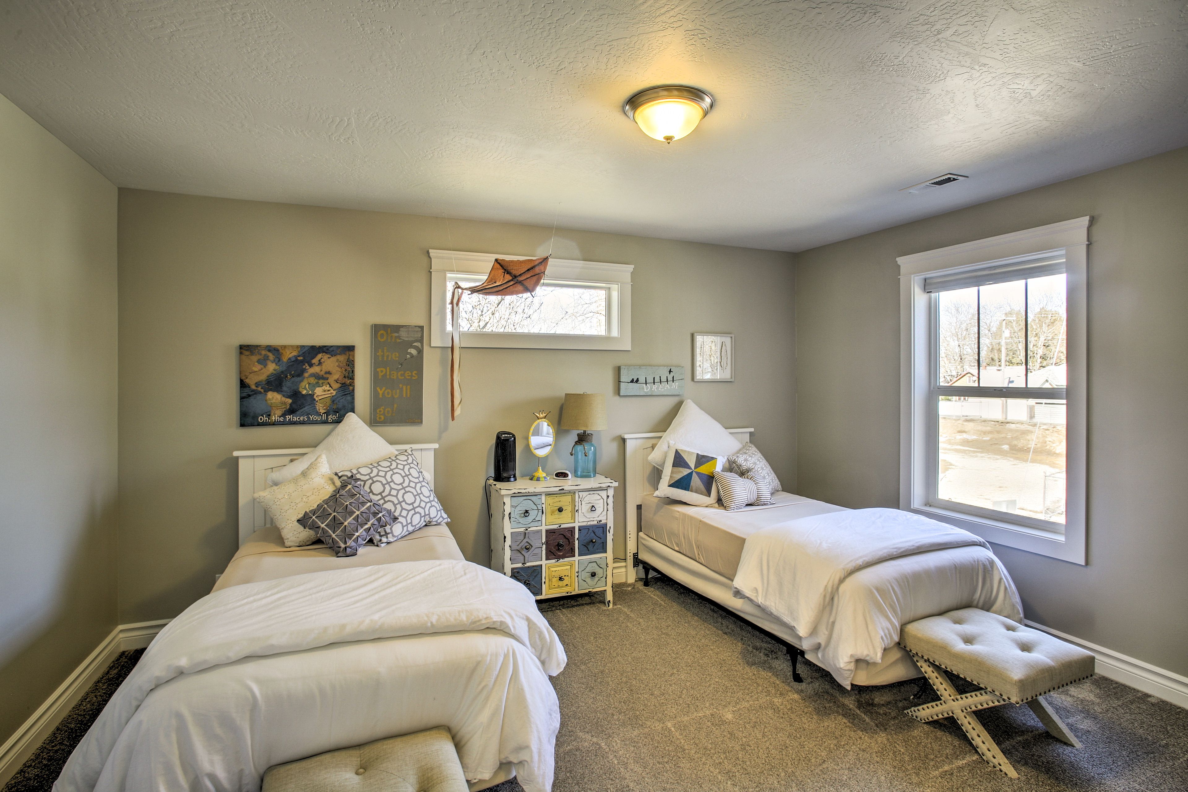 This cute bedroom with 2 twin-sized beds is perfect for kiddos.