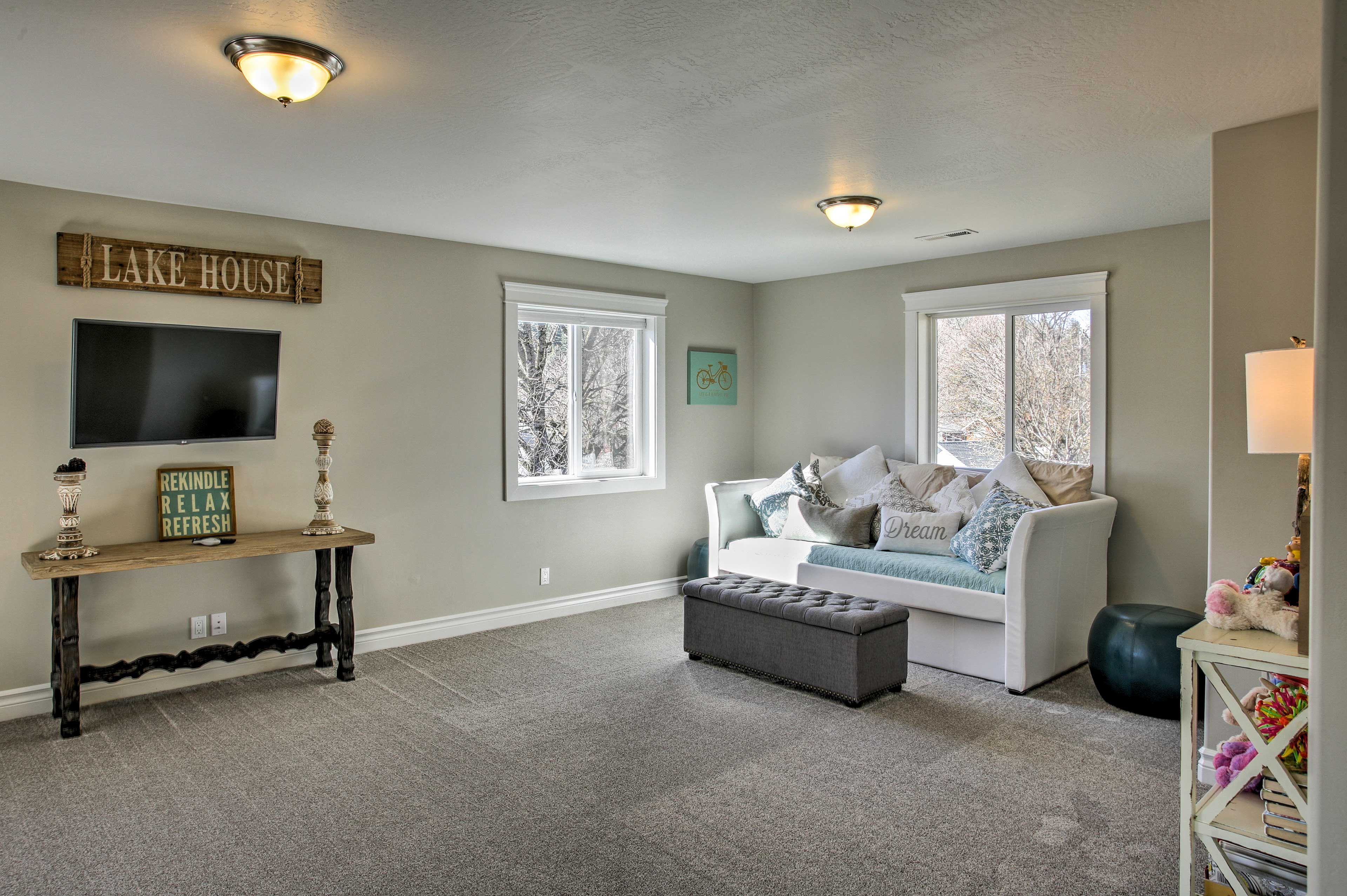 Guests can rest their heads on the futon with pullout trundle.