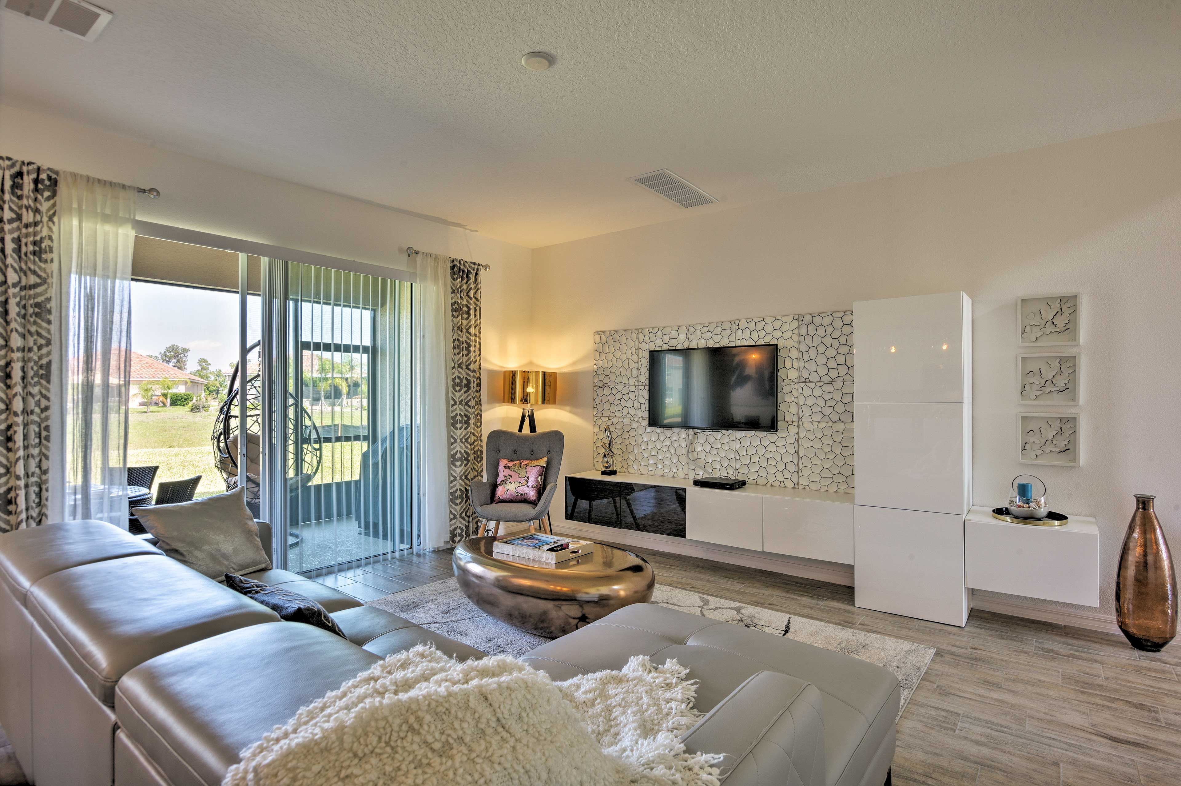 Relax on the sumptuous couch in the living room.
