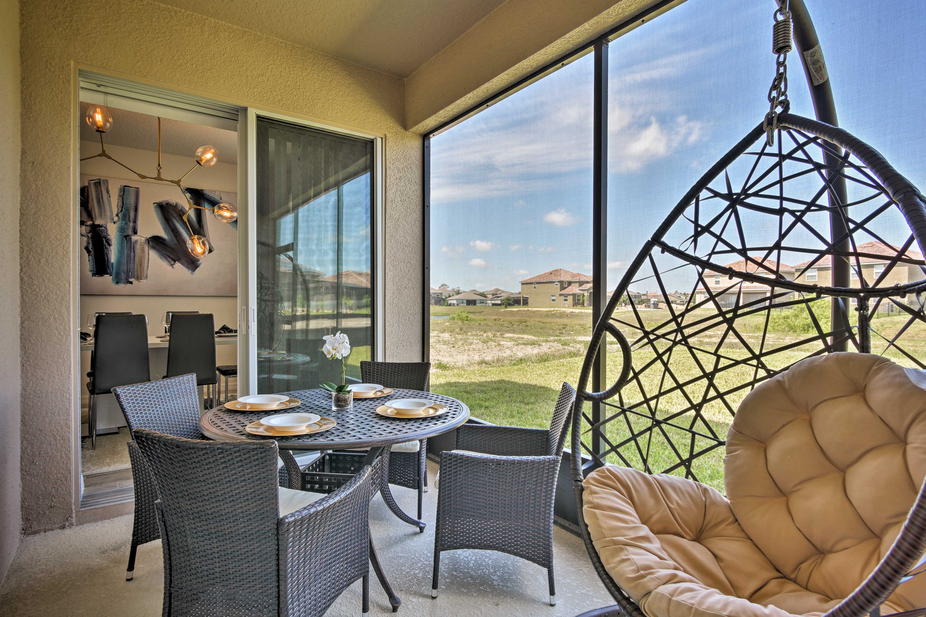 Step from the dining room out to the back patio.