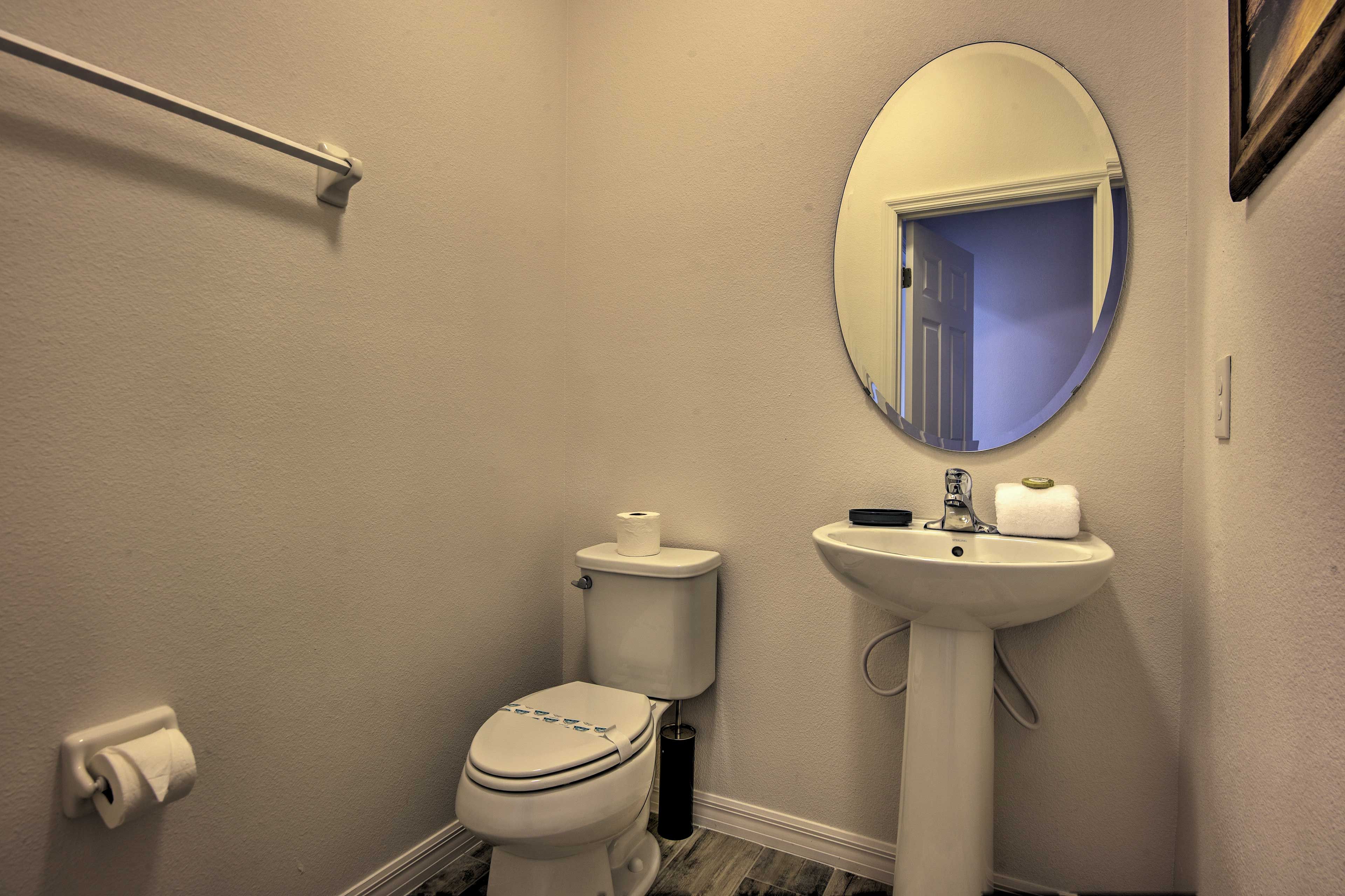 Wash your hands in the half bathroom.