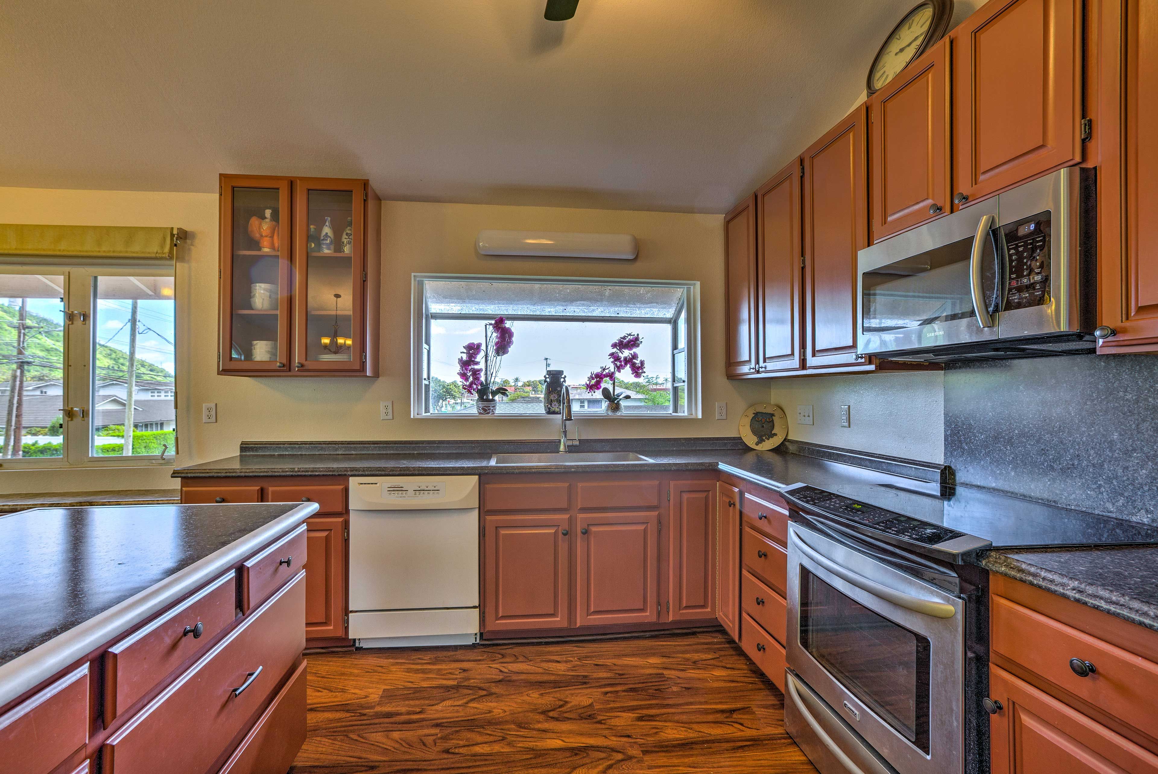 The kitchen is fully equipped with all of the necessary cookware.