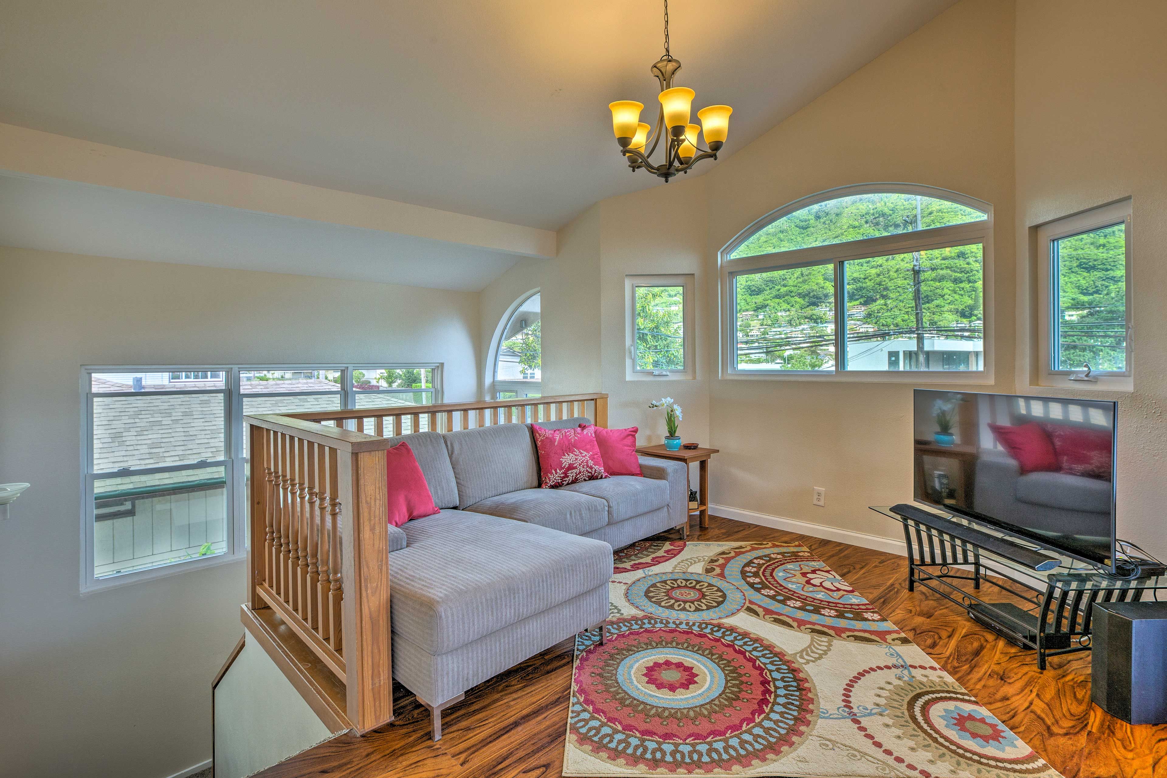 Watch movies on the flat-screen TV while lounging on the sectional.