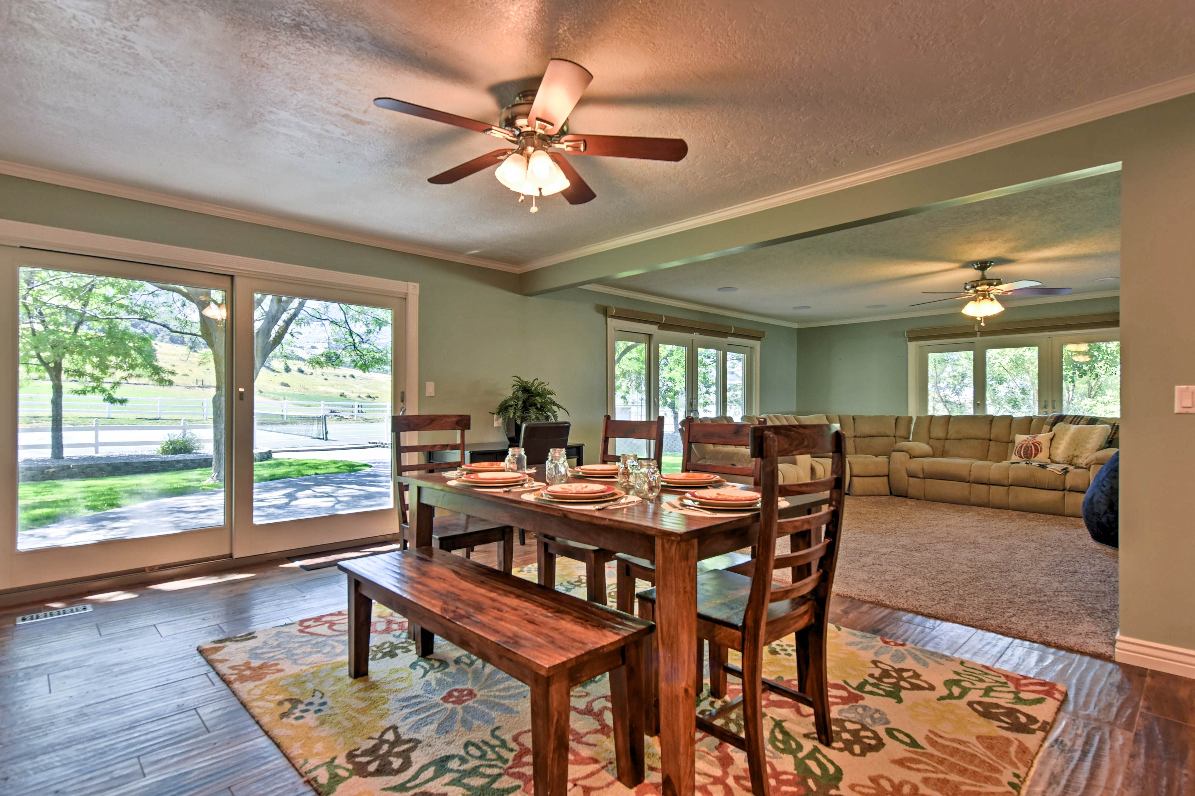 Steps away, the hardwood dining table seats 6 guests.