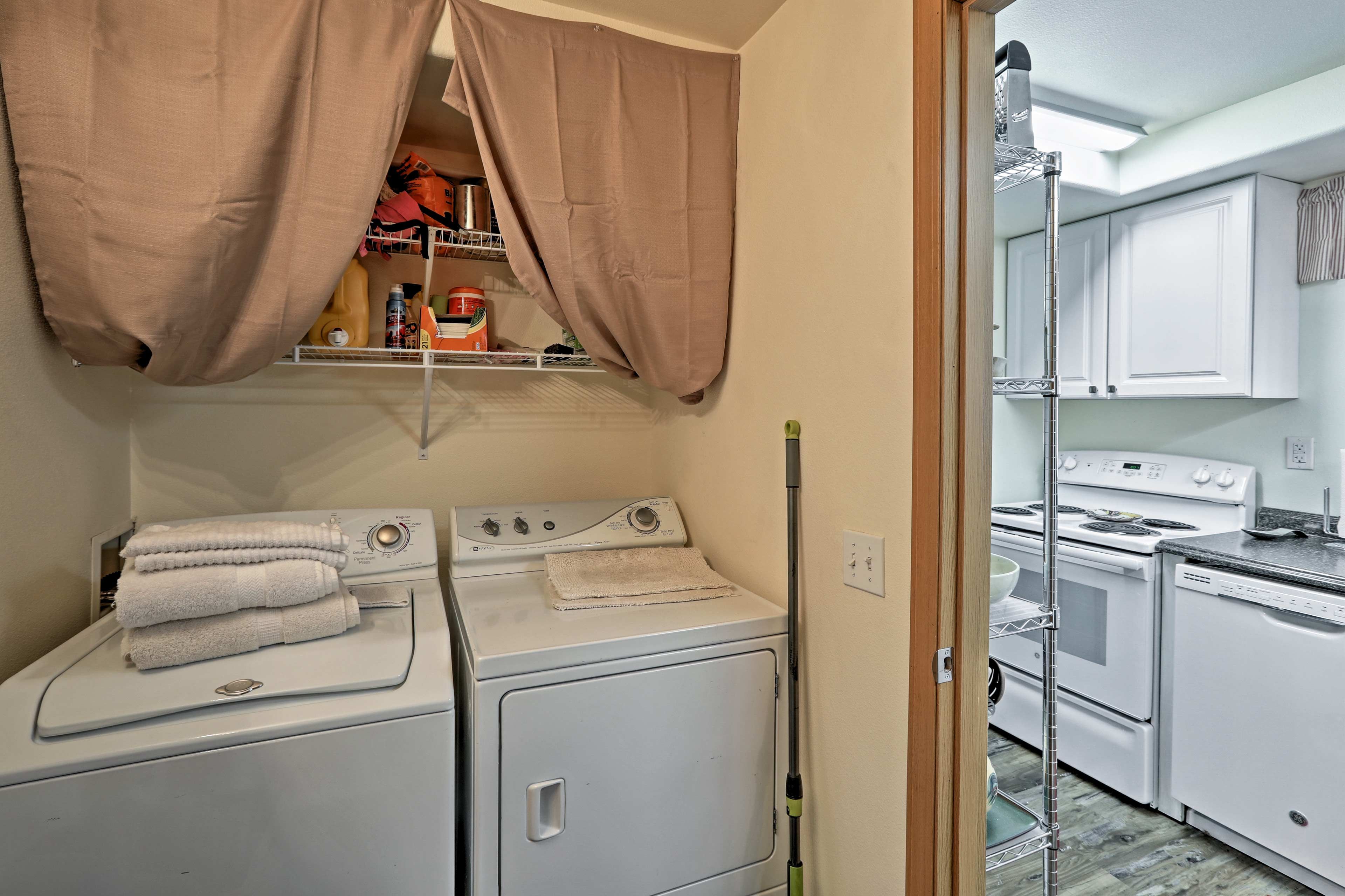 The half bathroom is located adjacent to the kitchen.