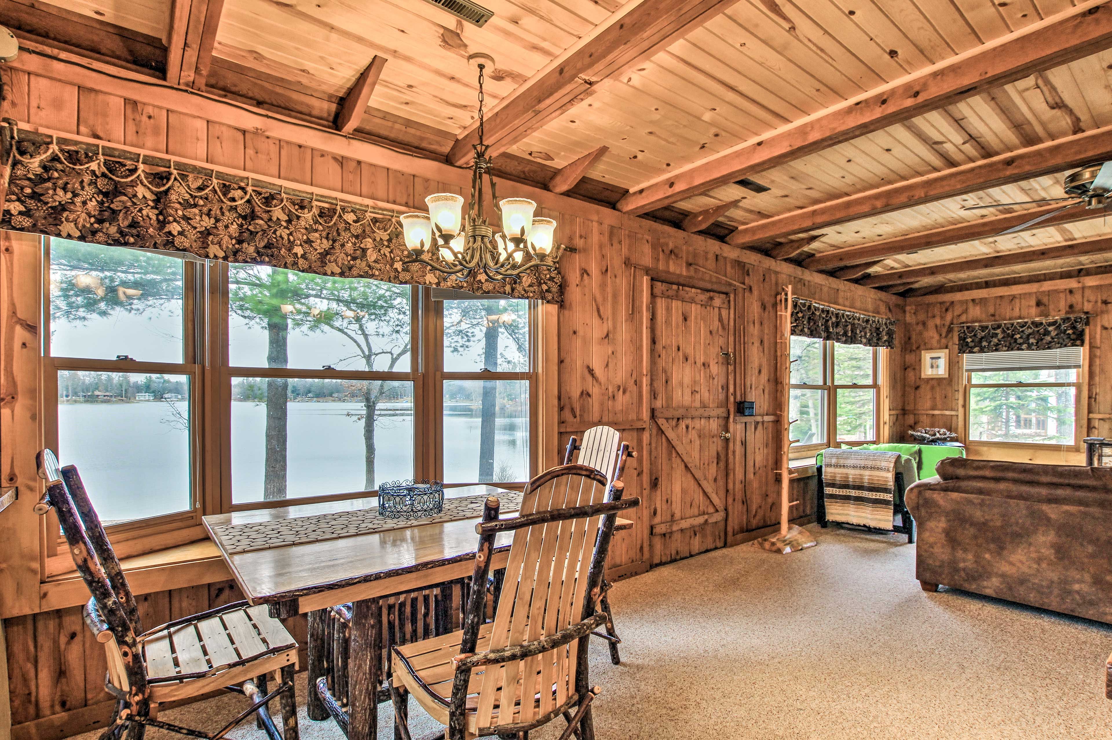 Admire the rustic wood paneling, which adds to the warm and cozy feel.