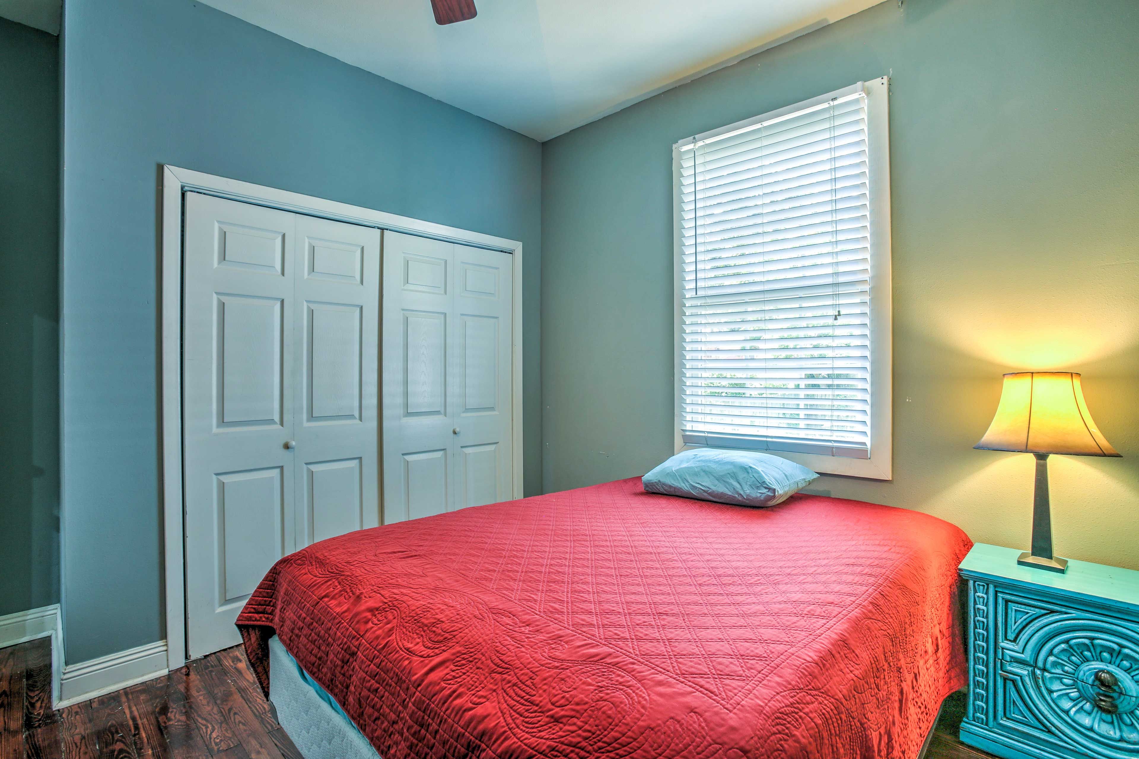This cozy bedroom is set on the main floor and features a plush queen bed.