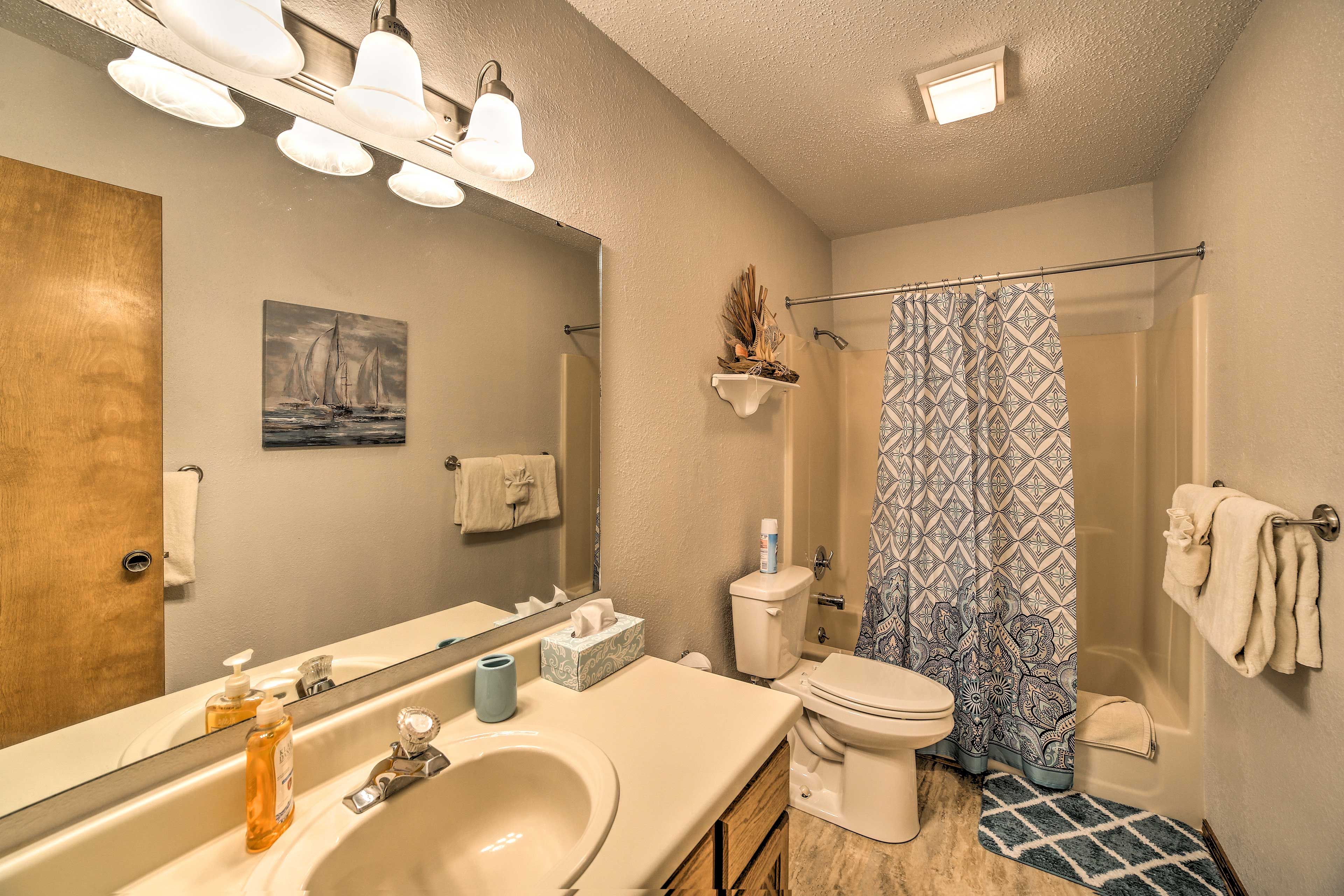 Soak your sun-kissed legs in the shower/tub combo.