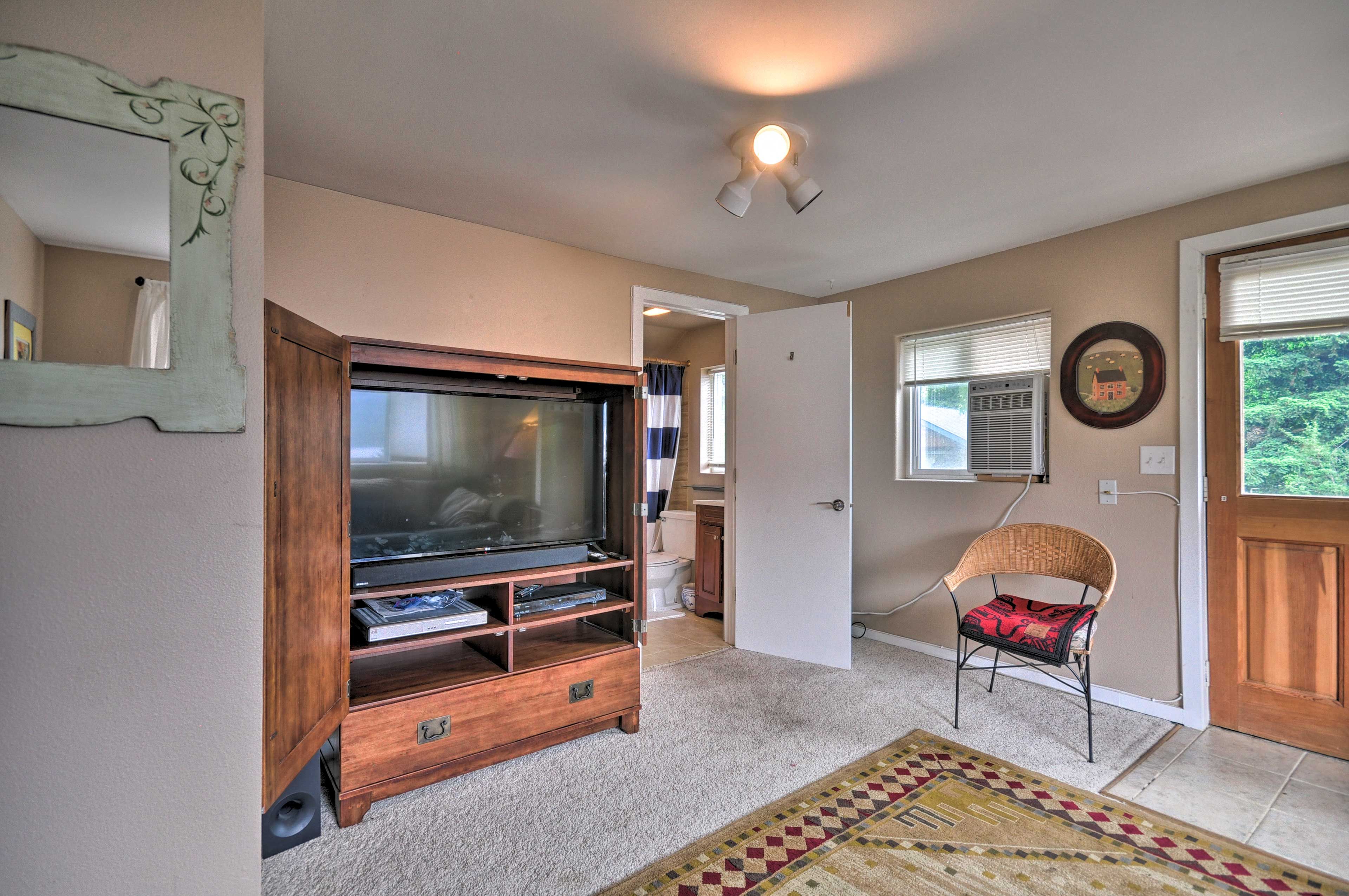 Continue to relax with your favorite movie playing on the flat-screen TV.