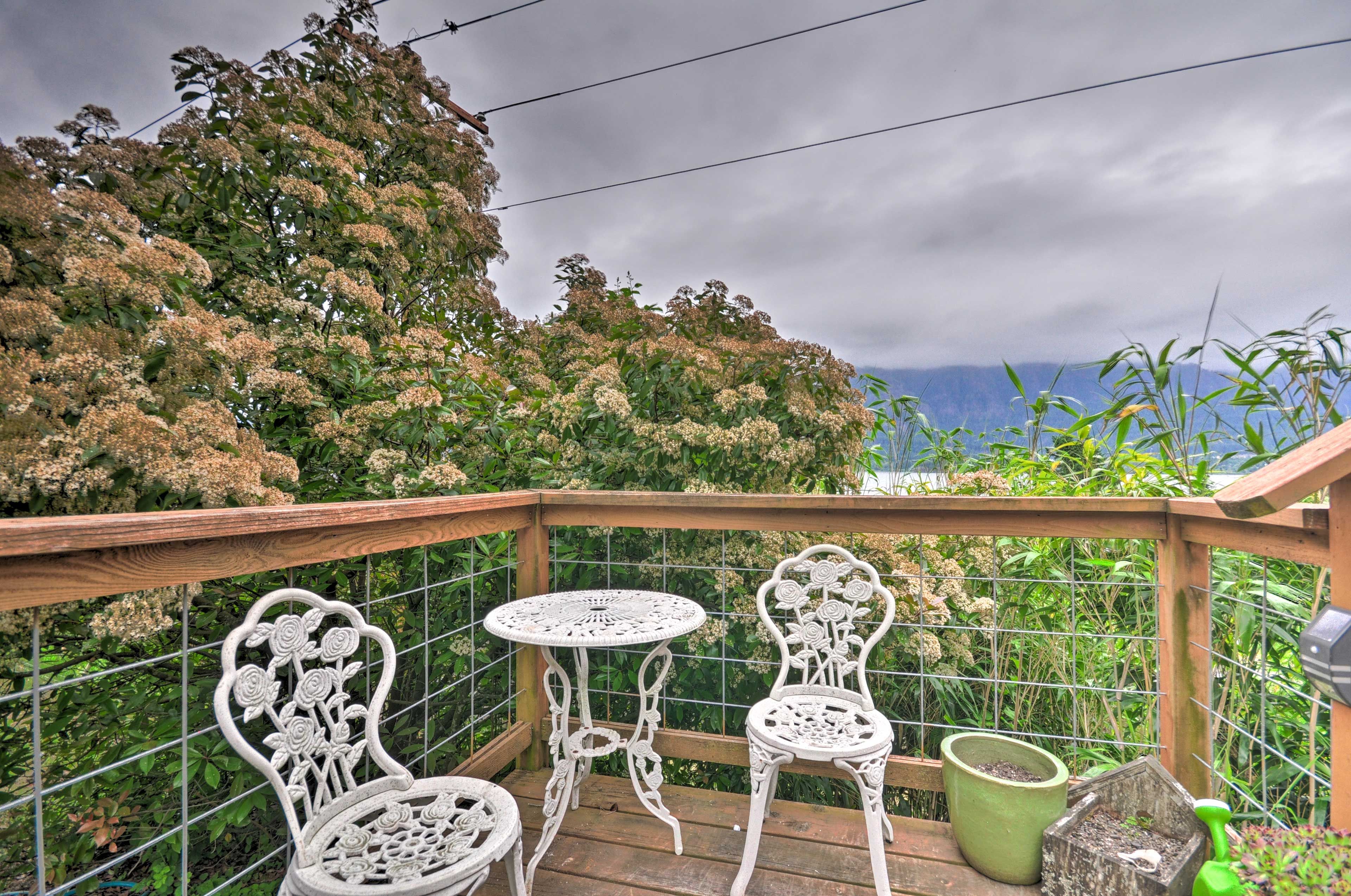 Savor morning coffee and evening nightcaps on the furnished deck.