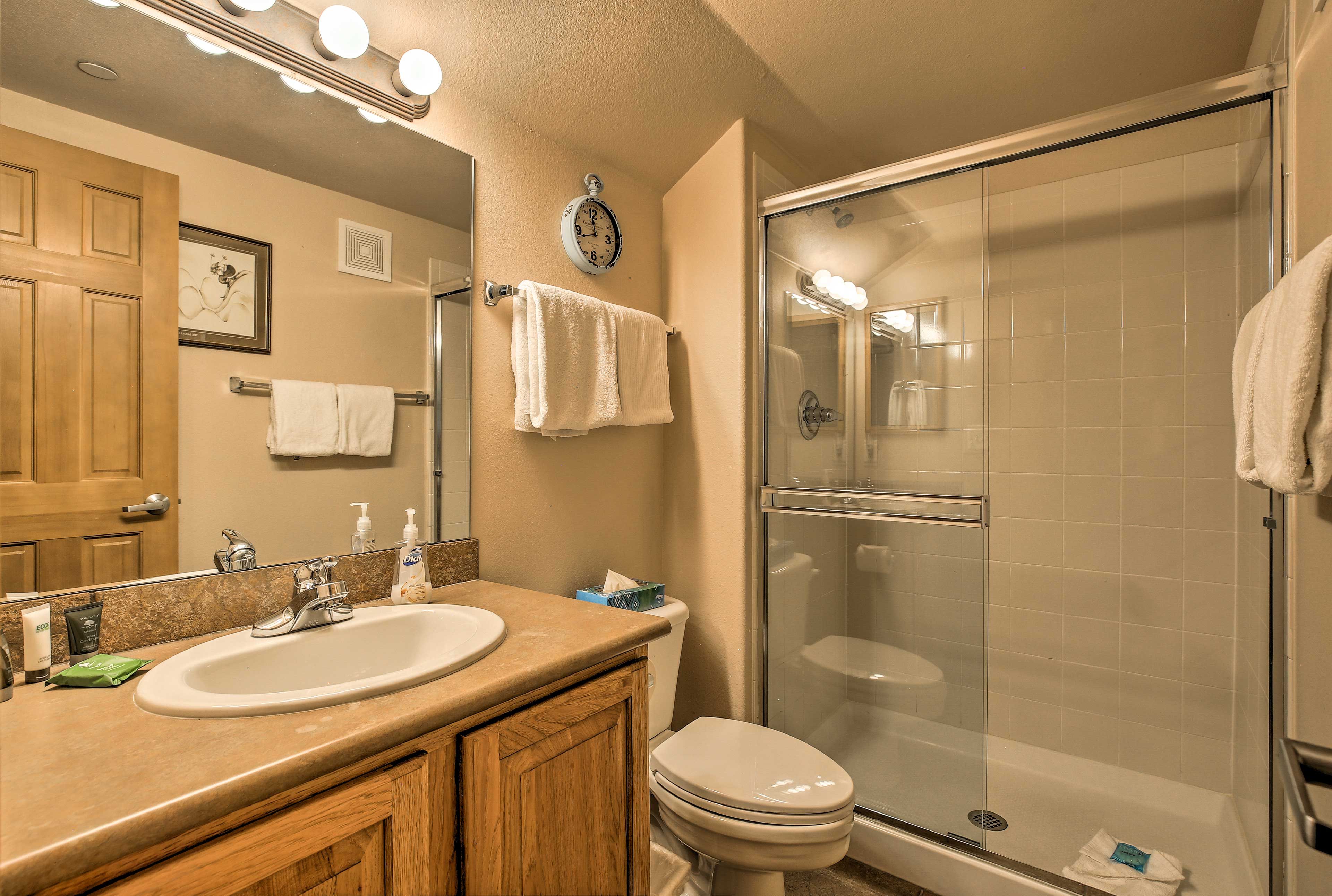 The condo features 3 full bathrooms, each stocked with fresh towels.