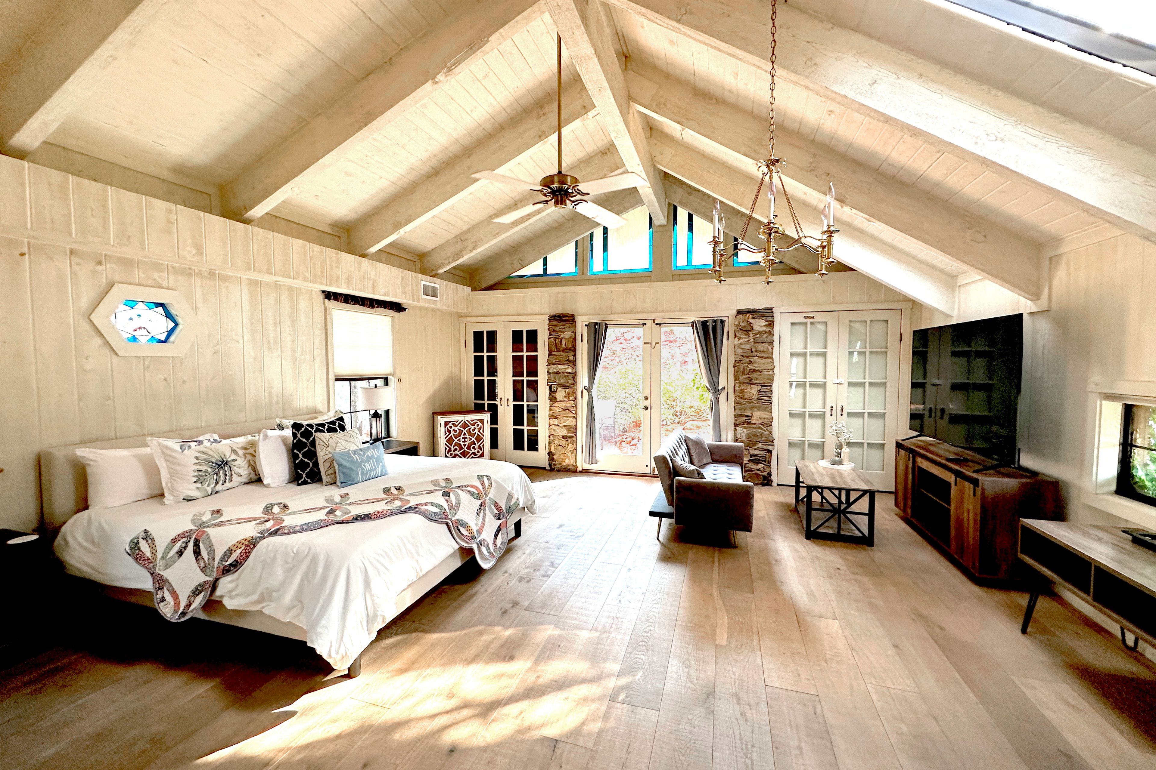 Bedroom Suite | King Bed | Antique Brass Chandelier | Stained Glass
