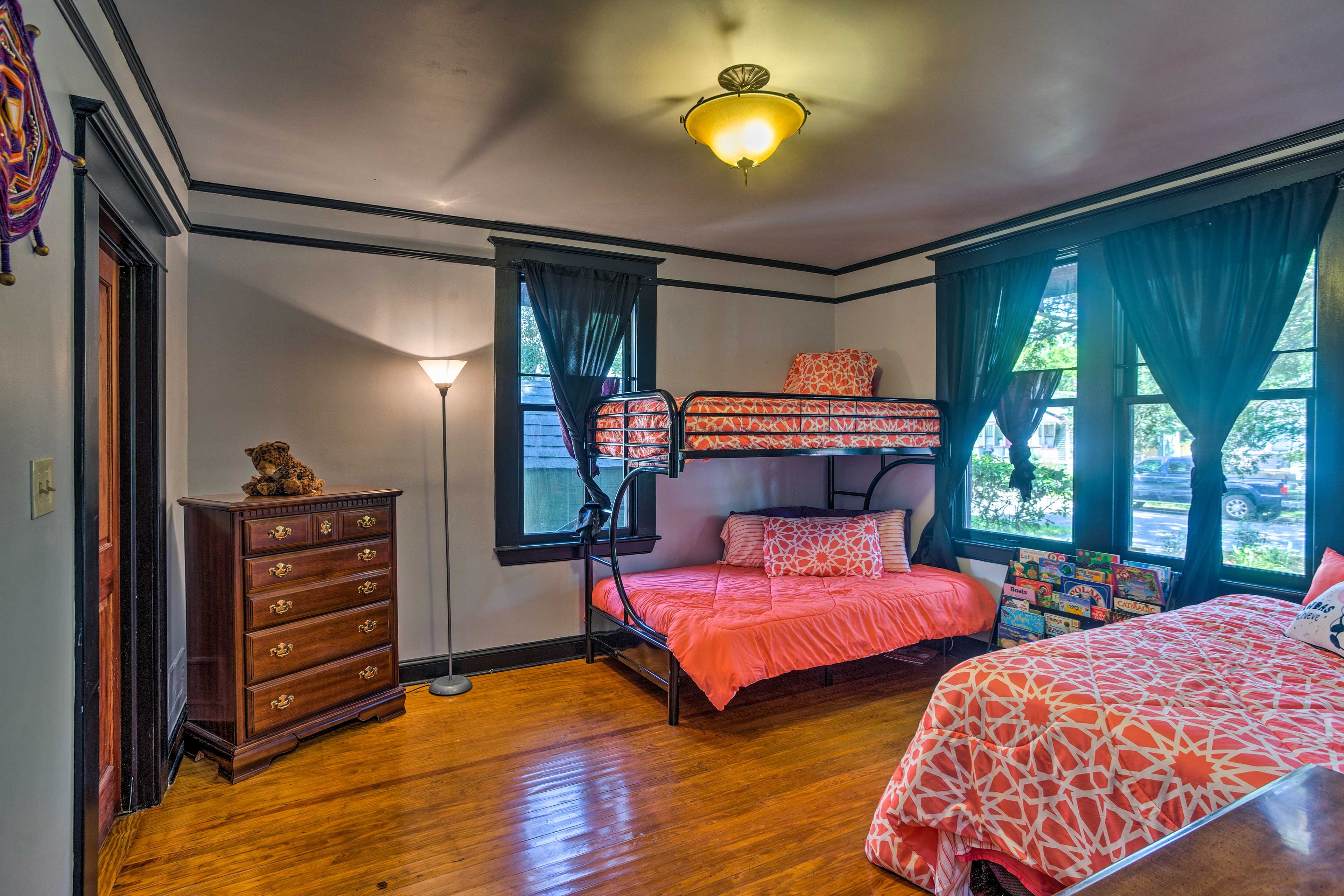 With a full bed and twin-over-full bunk, this room sleeps 5.