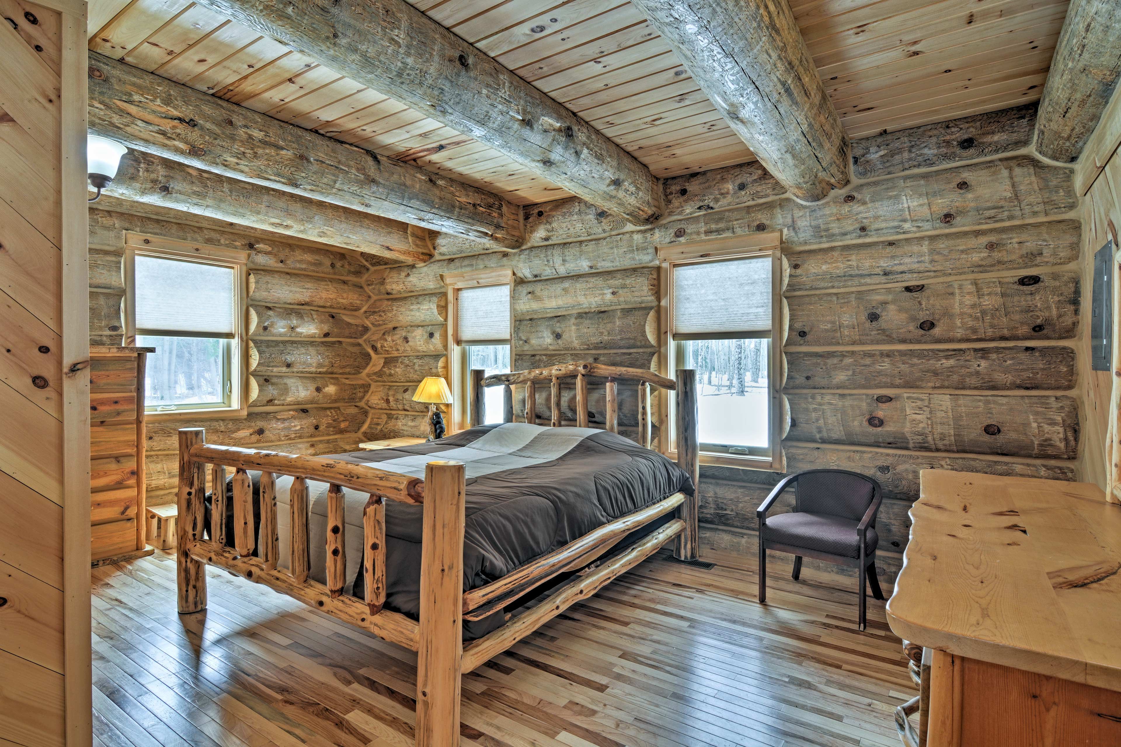 The first bedroom houses a grand king-sized bed.