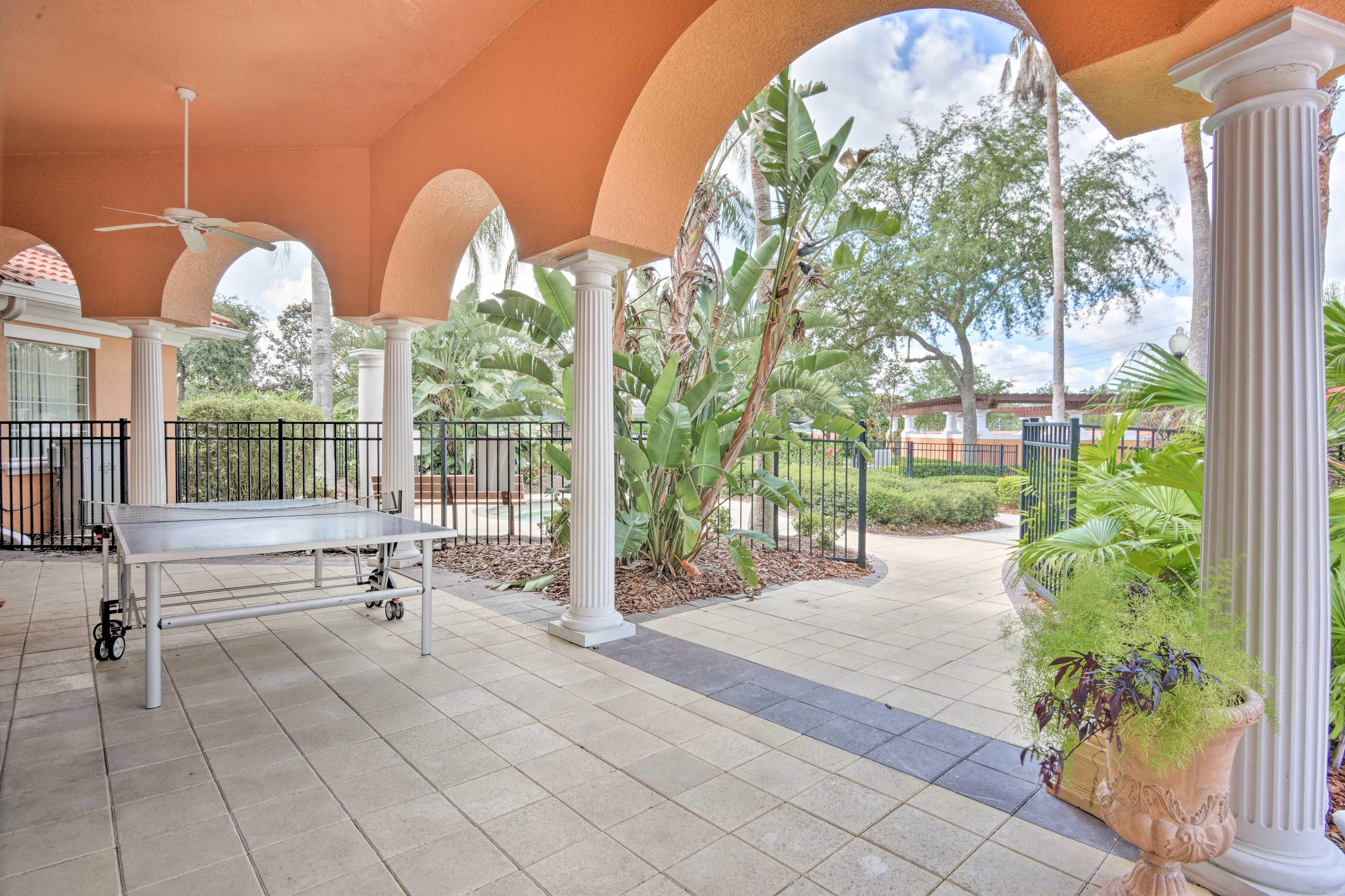 The clubhouse opens to the luxurious pool patio.