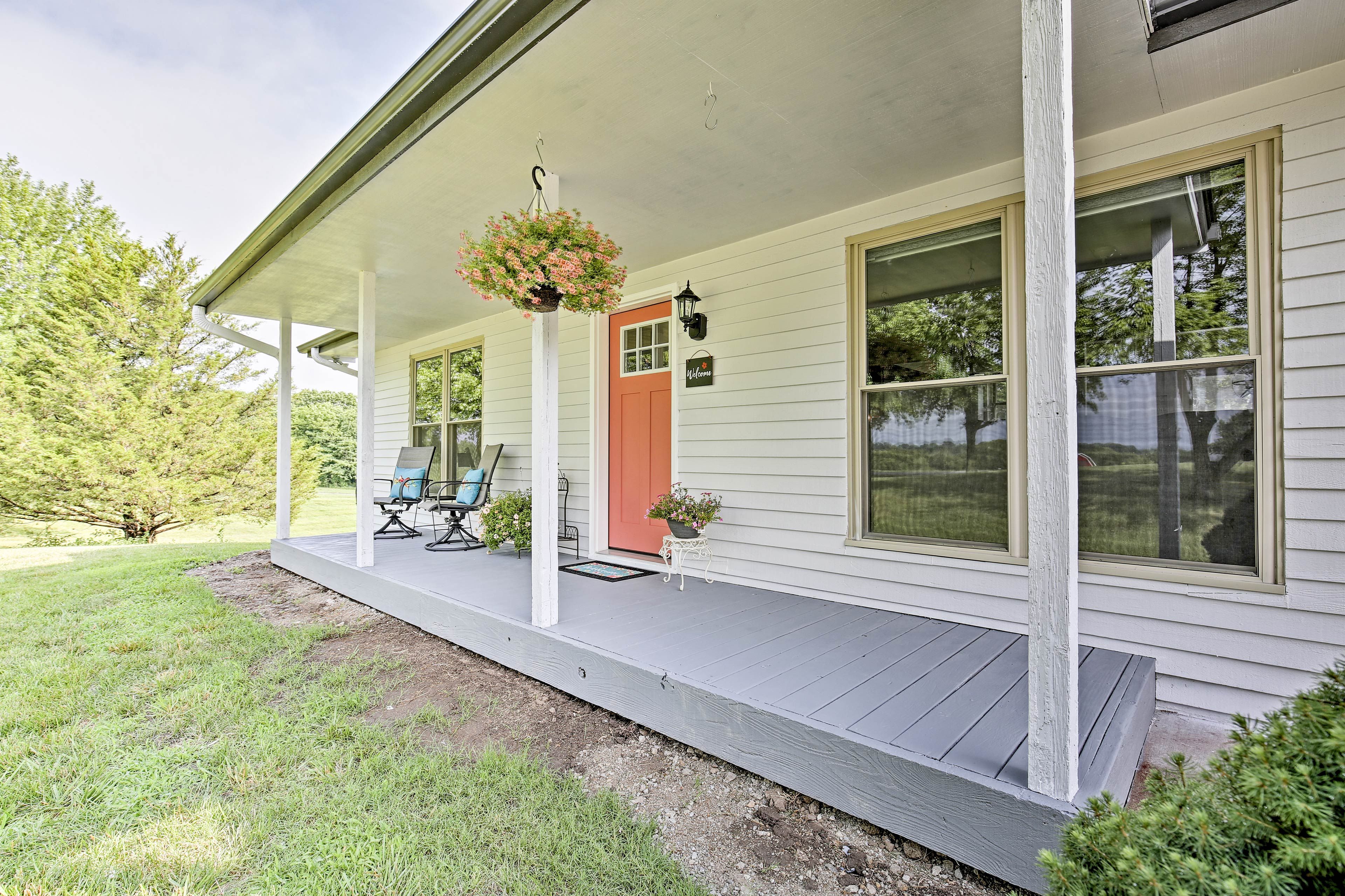 The long front porch will be your favorite spot to relax and unwind.