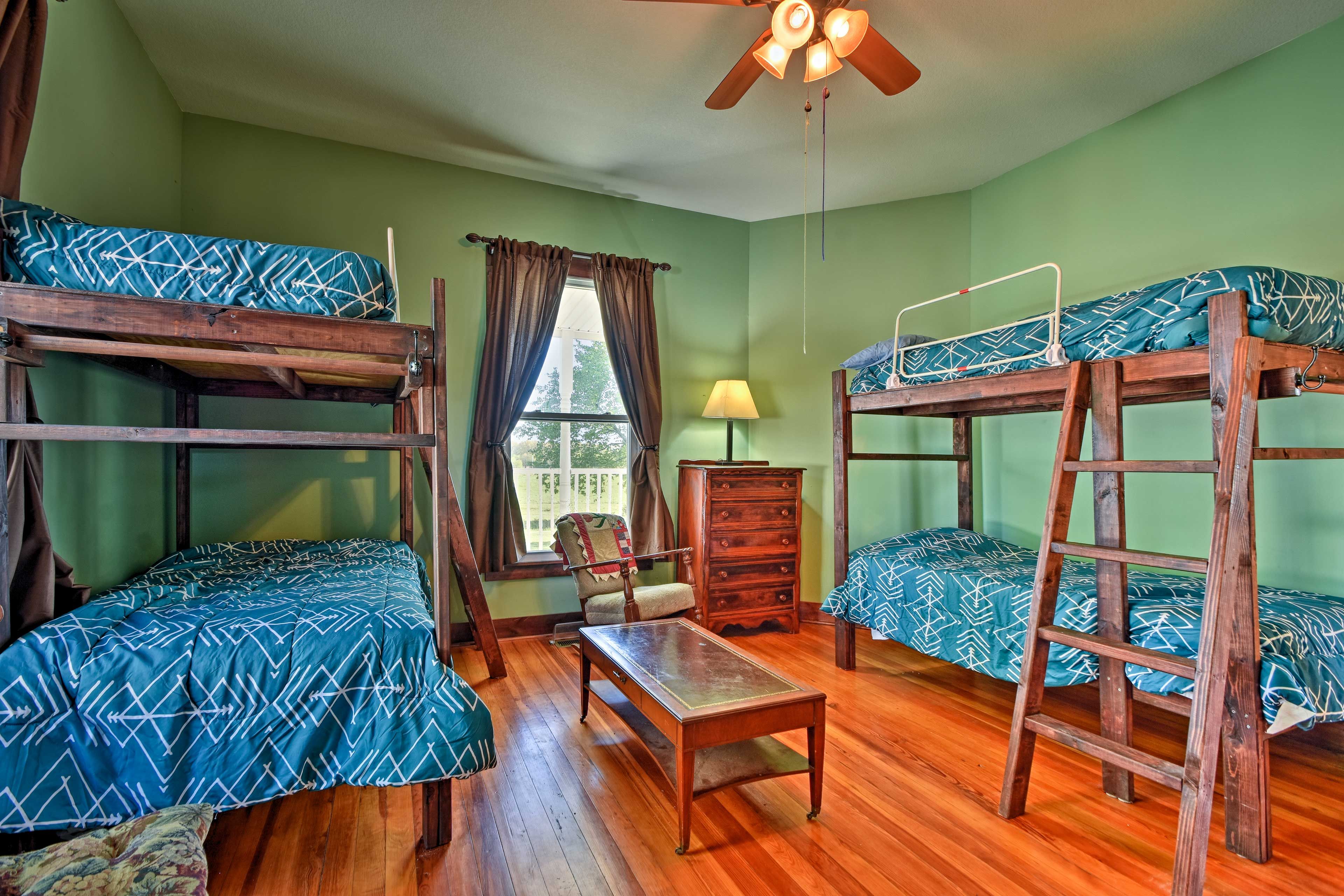 Dive under the covers in the twin bunk beds.