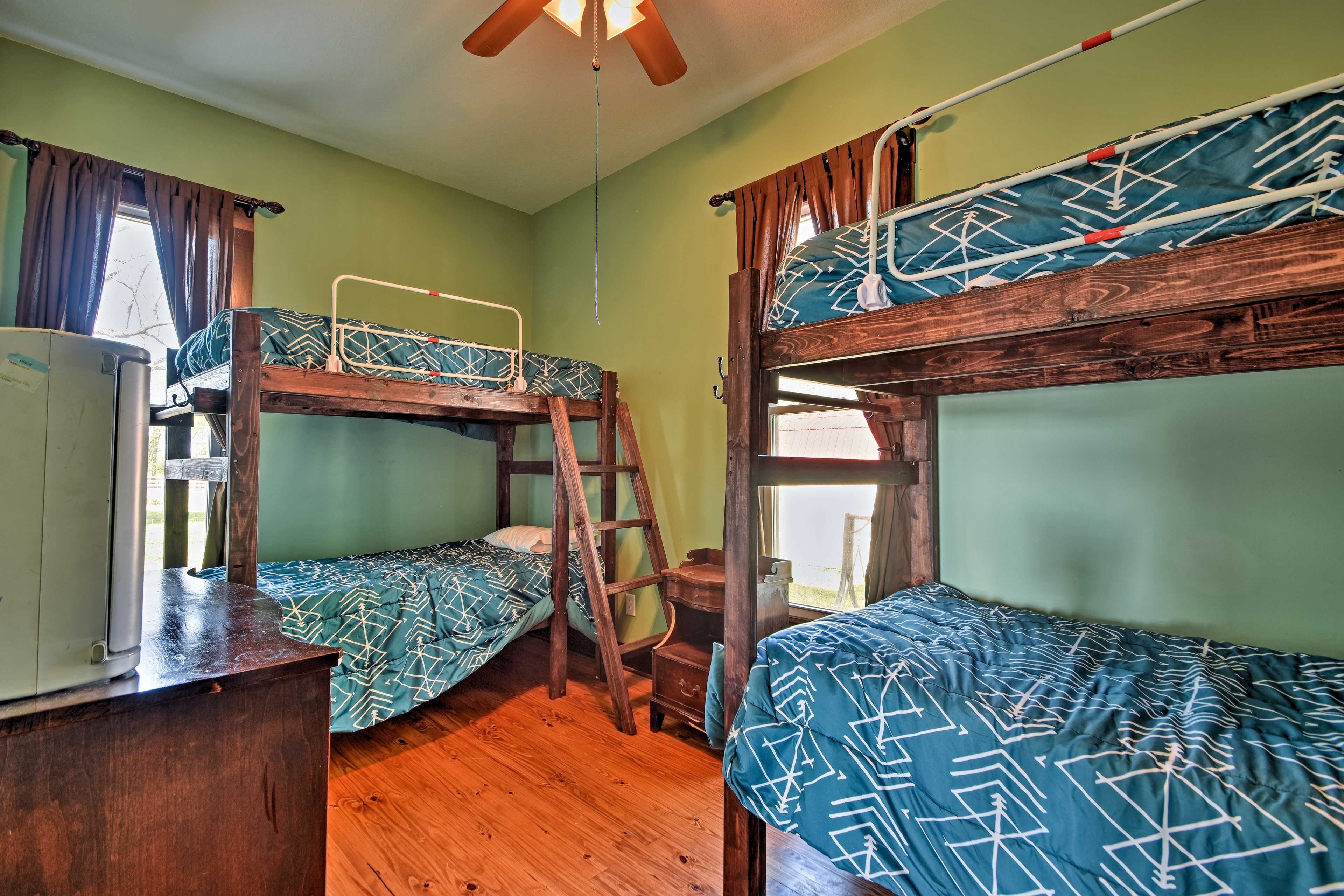 The second bedroom also has a set of twin bunk beds.