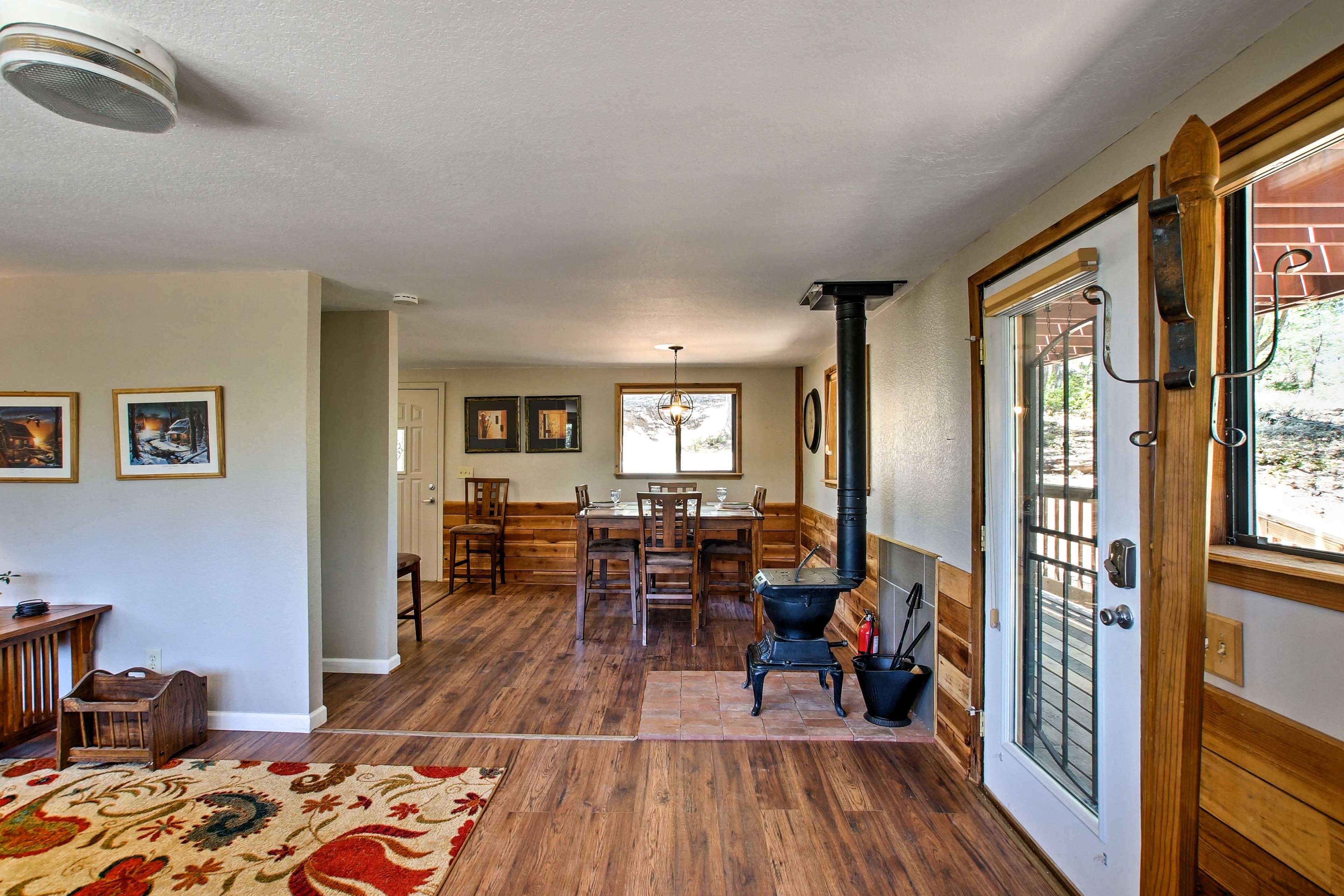 This home is highlighted by rich hardwood floors and rustic decor.