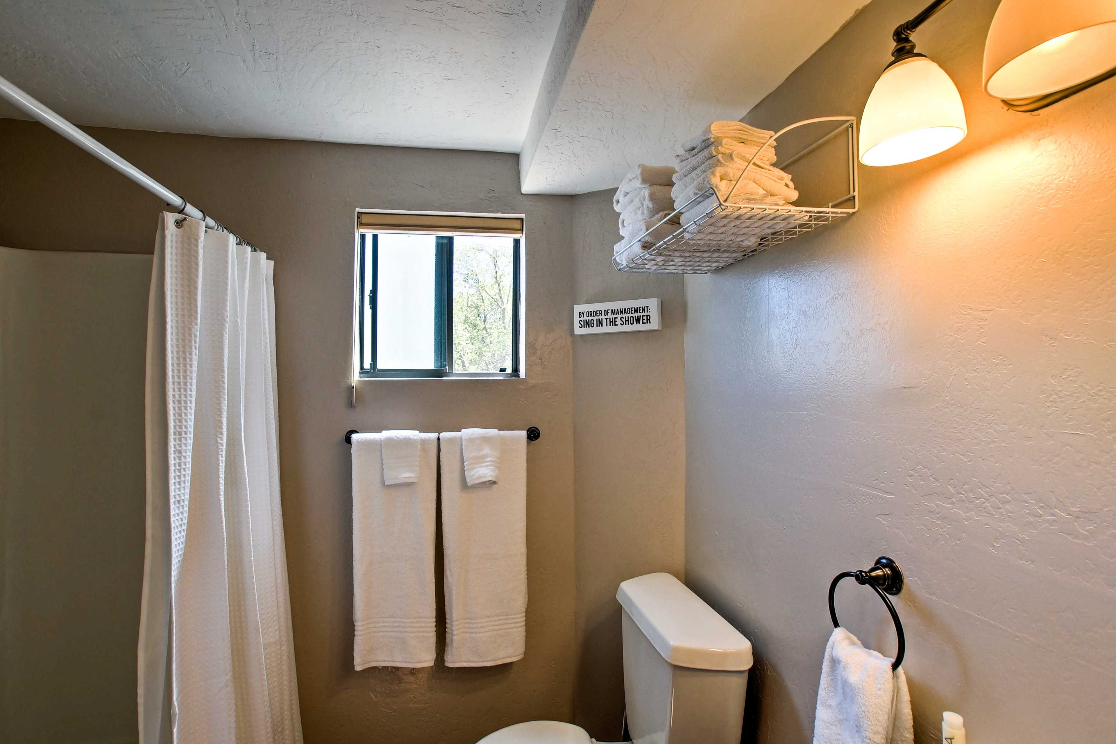 Rise and shine with a refreshing shower in this full bathroom.