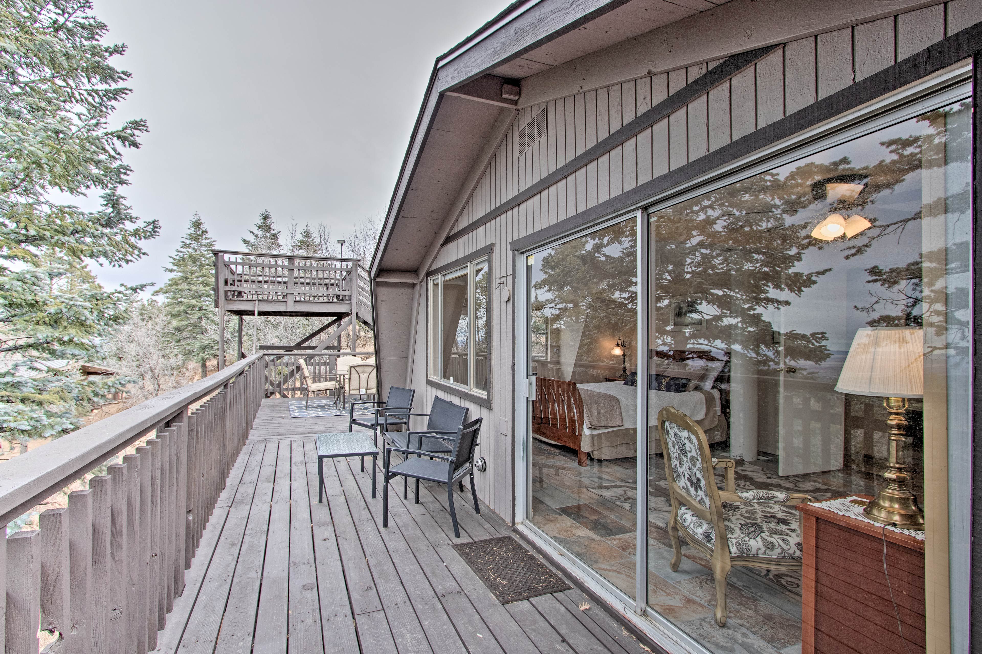 Step through the sliding glass doors out to your private deck.