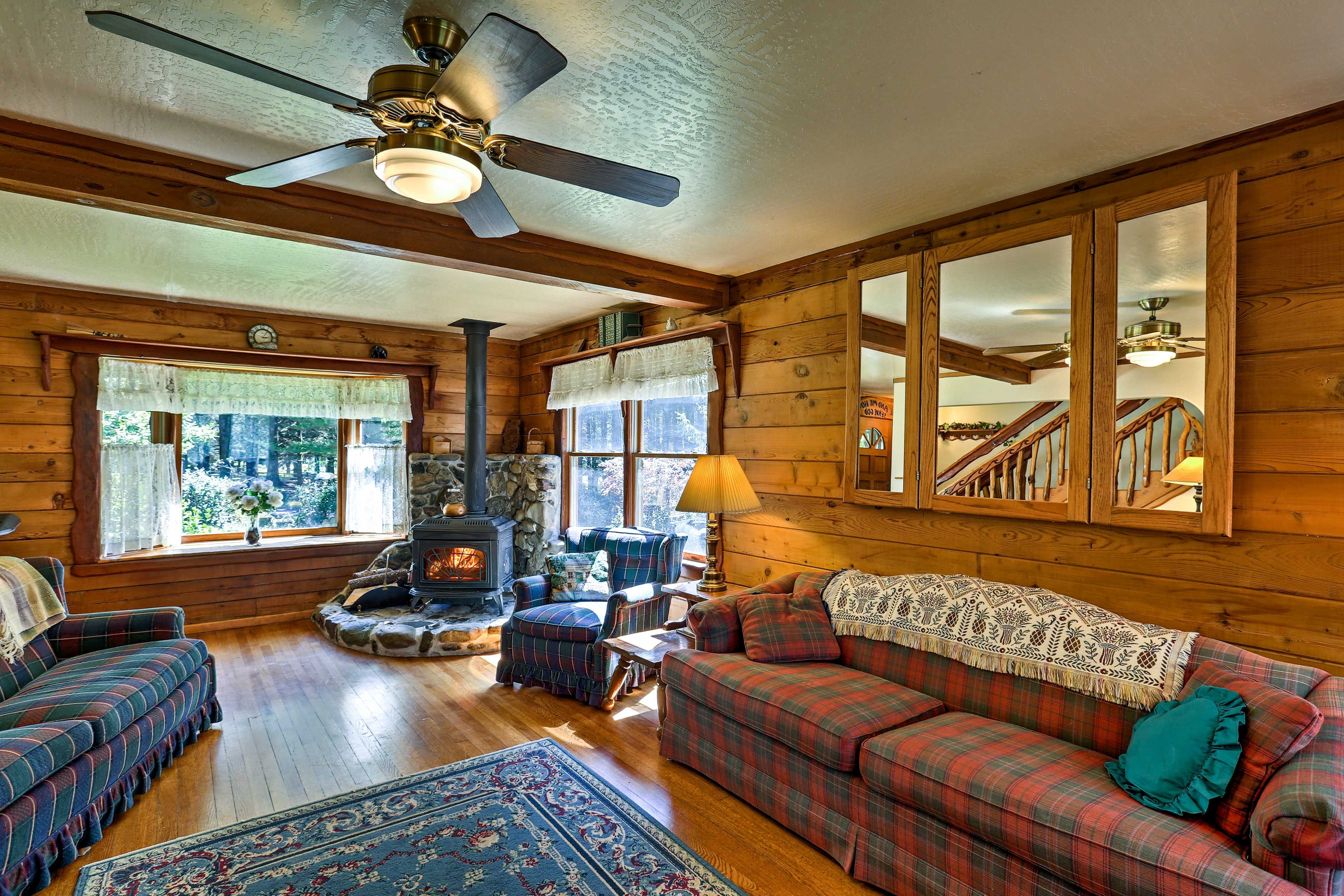 This charming abode features custom design and wood-burning stove.