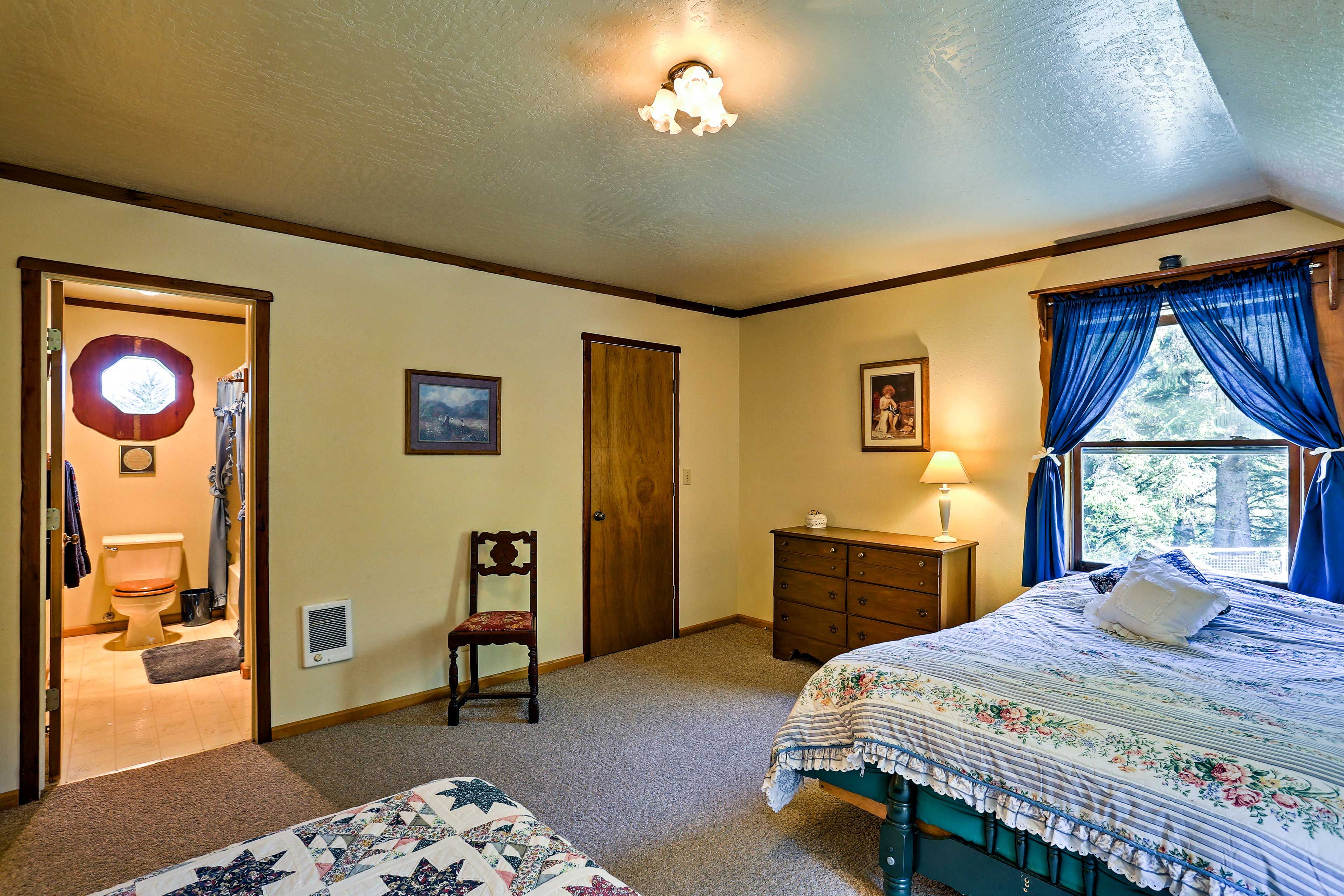 The second bedroom also includes a queen and full bed.
