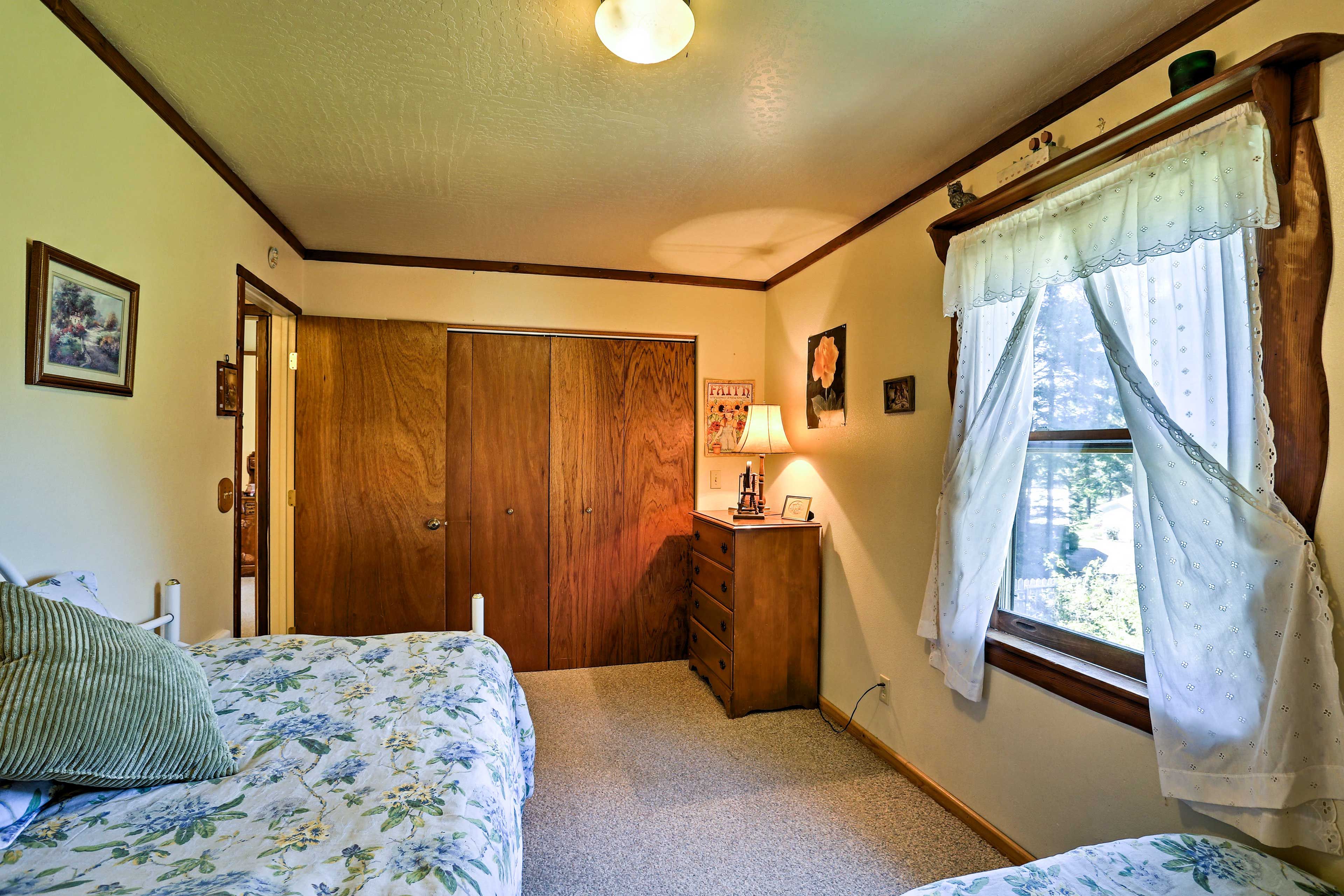 Two can claim these comfortable twin beds.